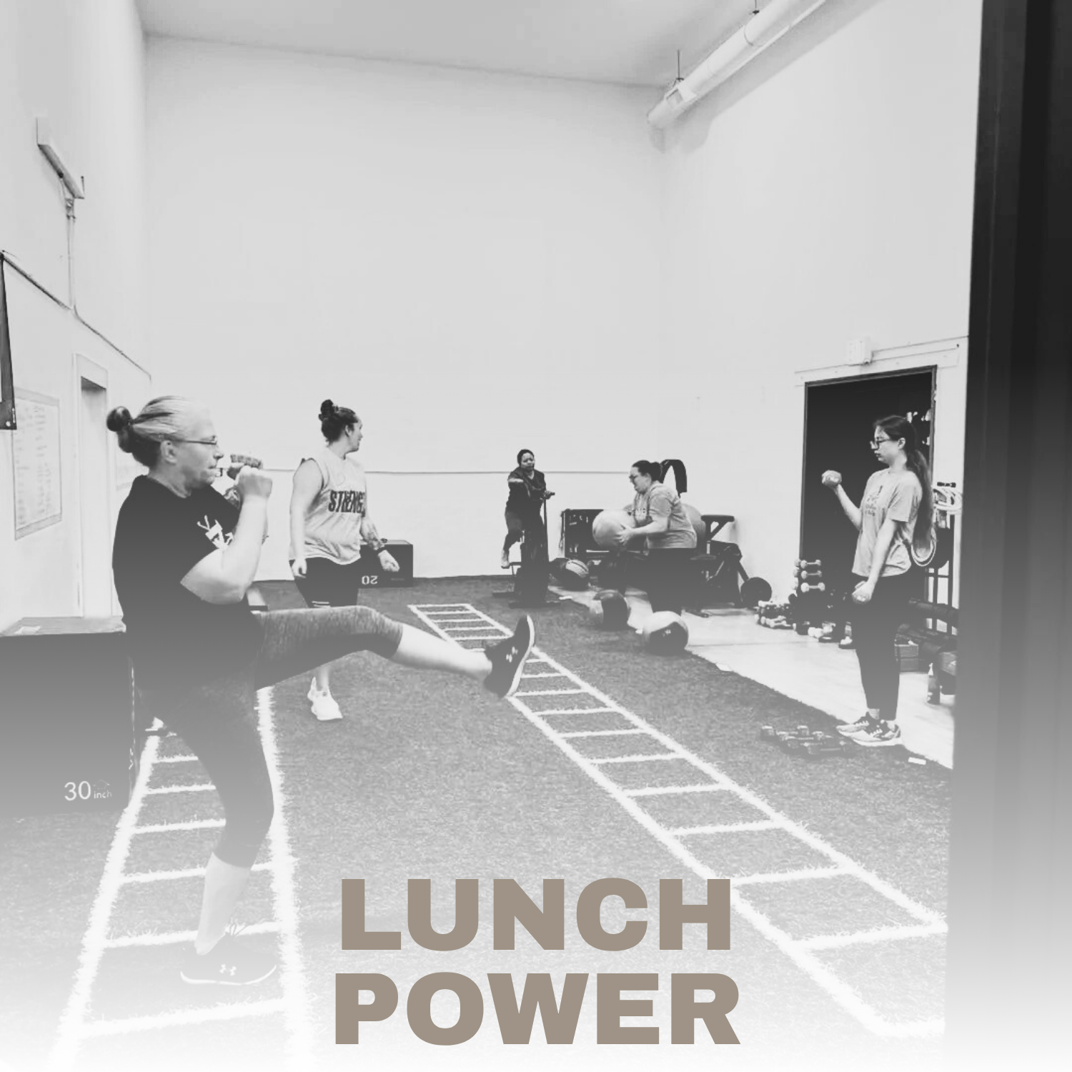 Group of women exercising indoors with weights, a medicine ball, and a jump ladder, in a fitness class with the words 'LUNCH POWER' overlaid.