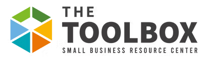 Logo of The Toolbox, featuring a stylized open toolbox icon with multiple colors and the text 'THE TOOLBOX' beside it