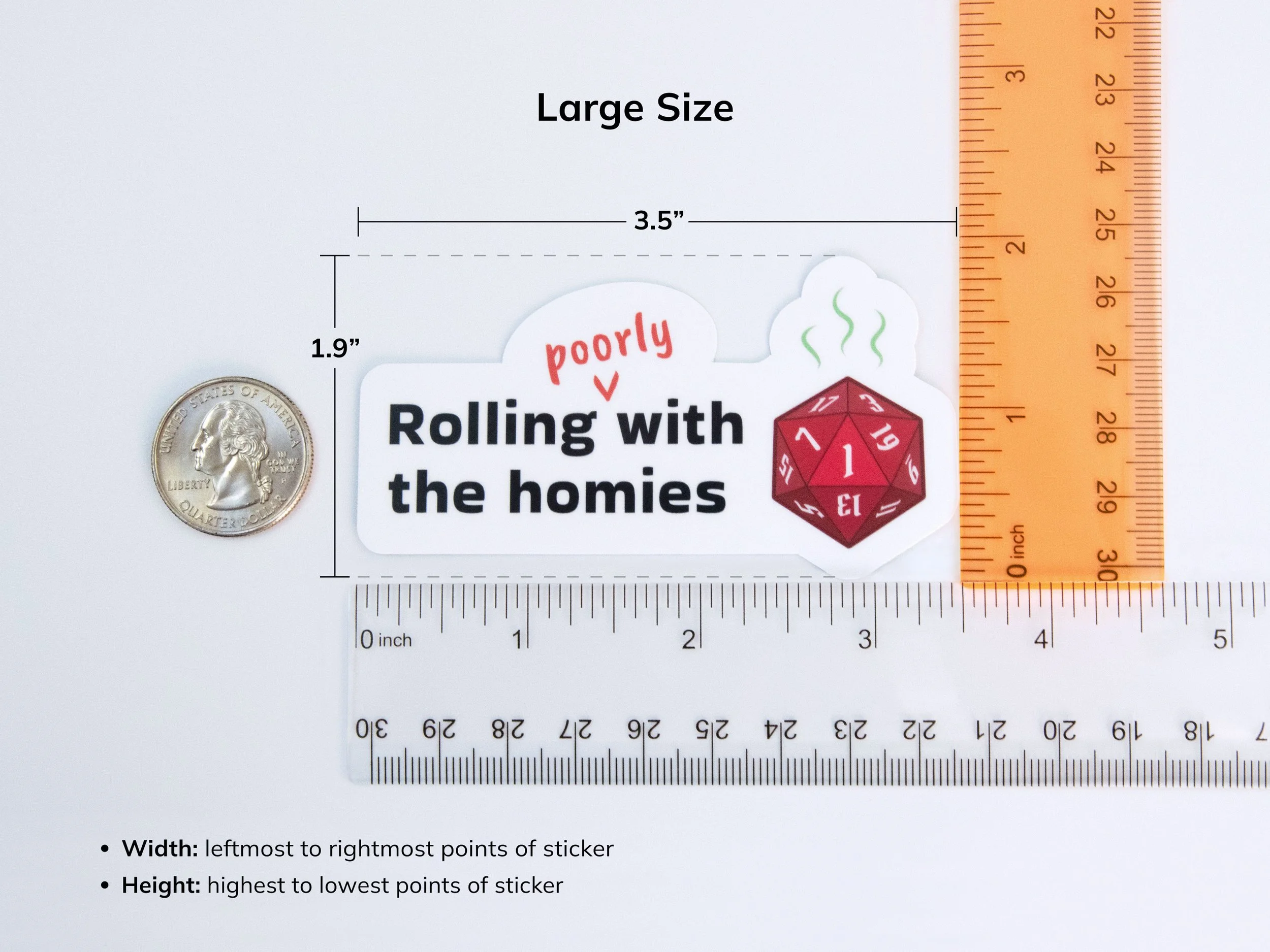 Example of the large sticker size next to rulers and a quarter to show scale. The sticker is 3.5” wide and 1.9” tall