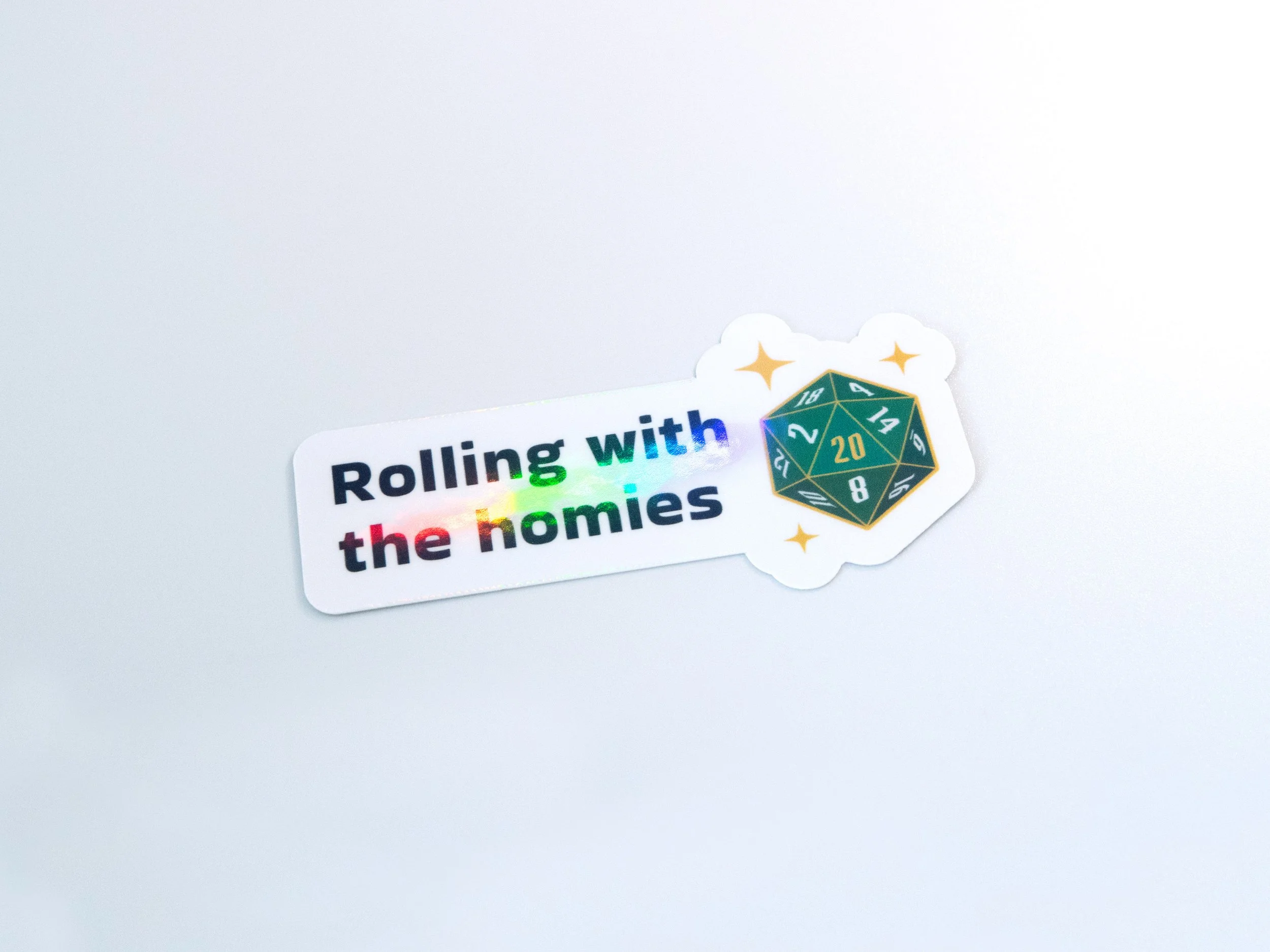“Rolling with the homies” sticker with a holographic rainbow finish