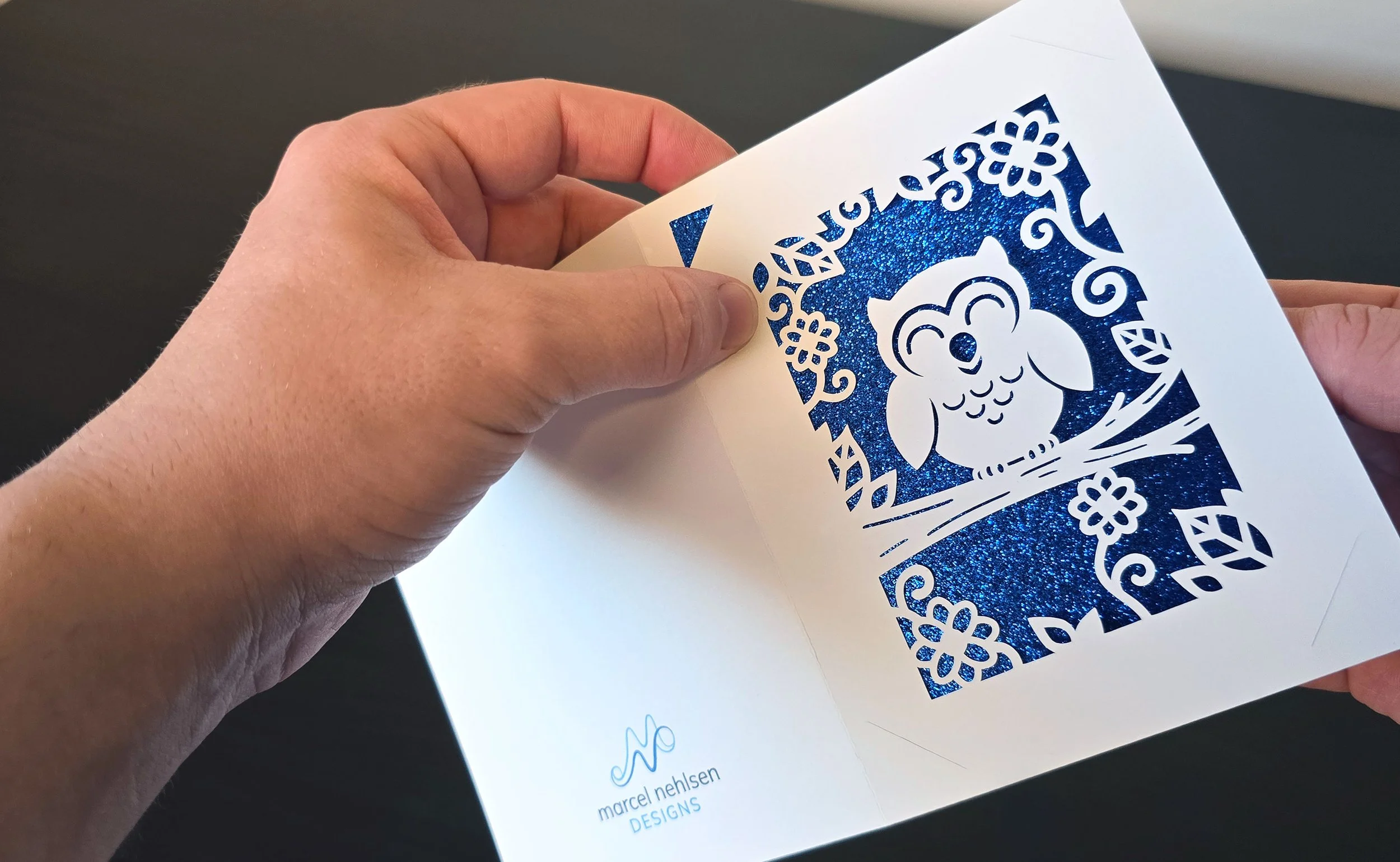 Assembling an owl-themed greeting card