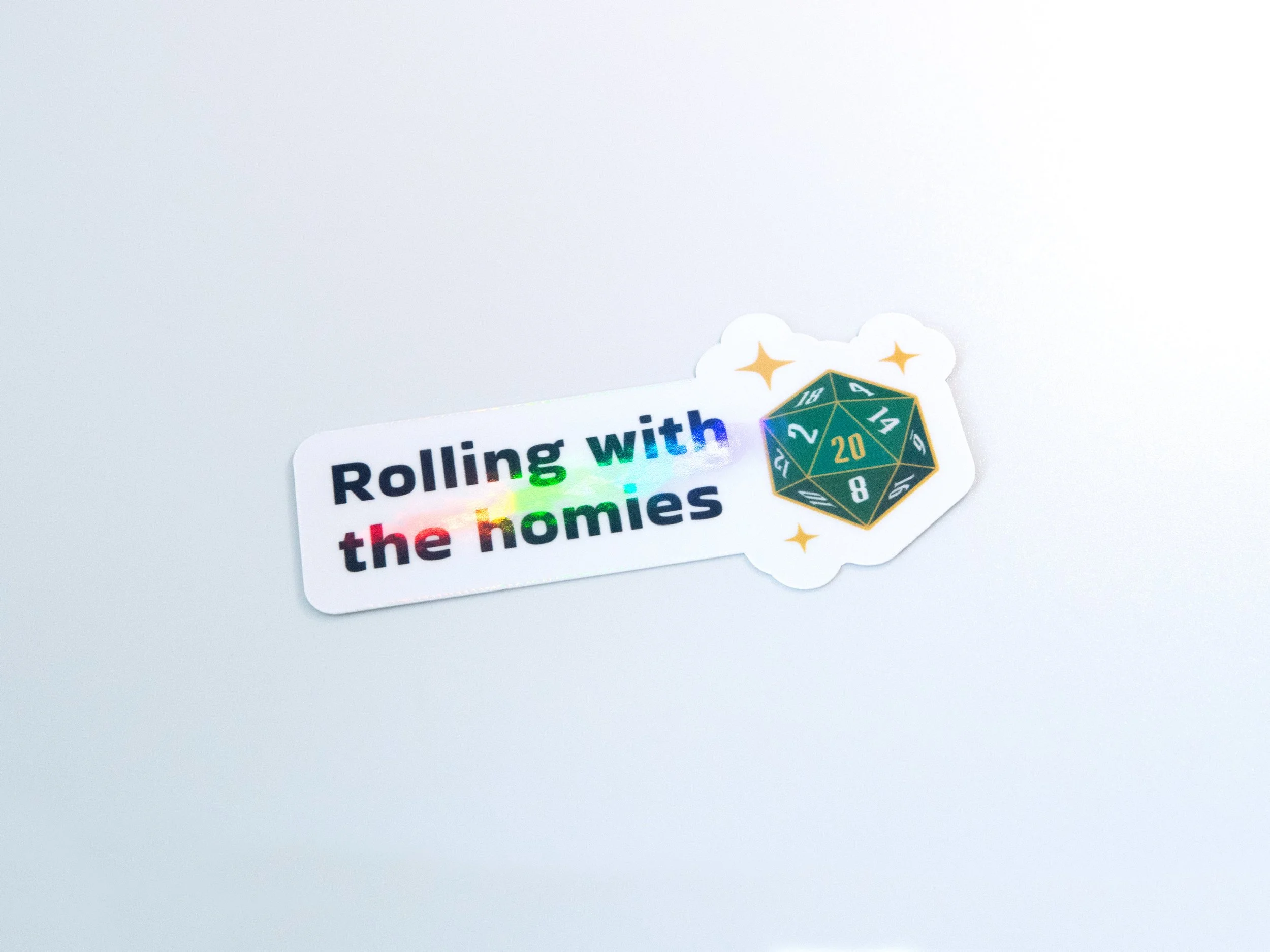 "Rolling with the homies" sticker with a holographic rainbow finish