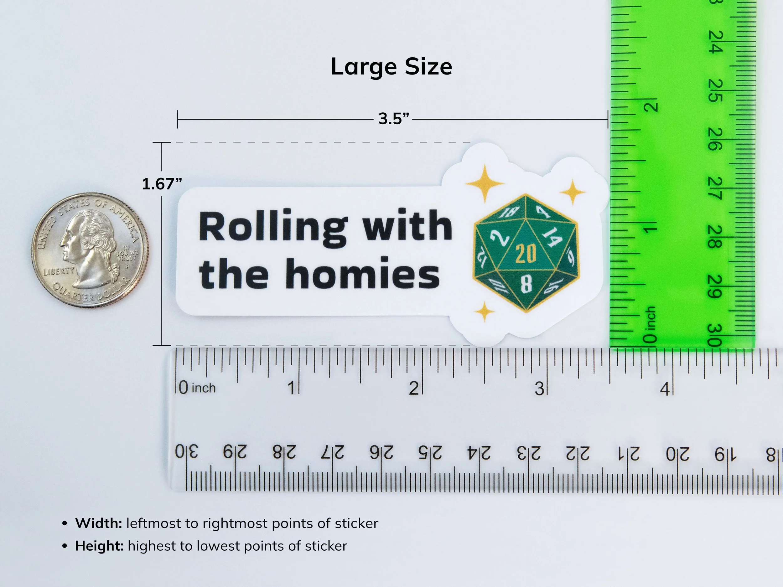 Example of the large sticker size next to rulers and a quarter to show scale. The sticker is 3.5” wide and 1.67” tall