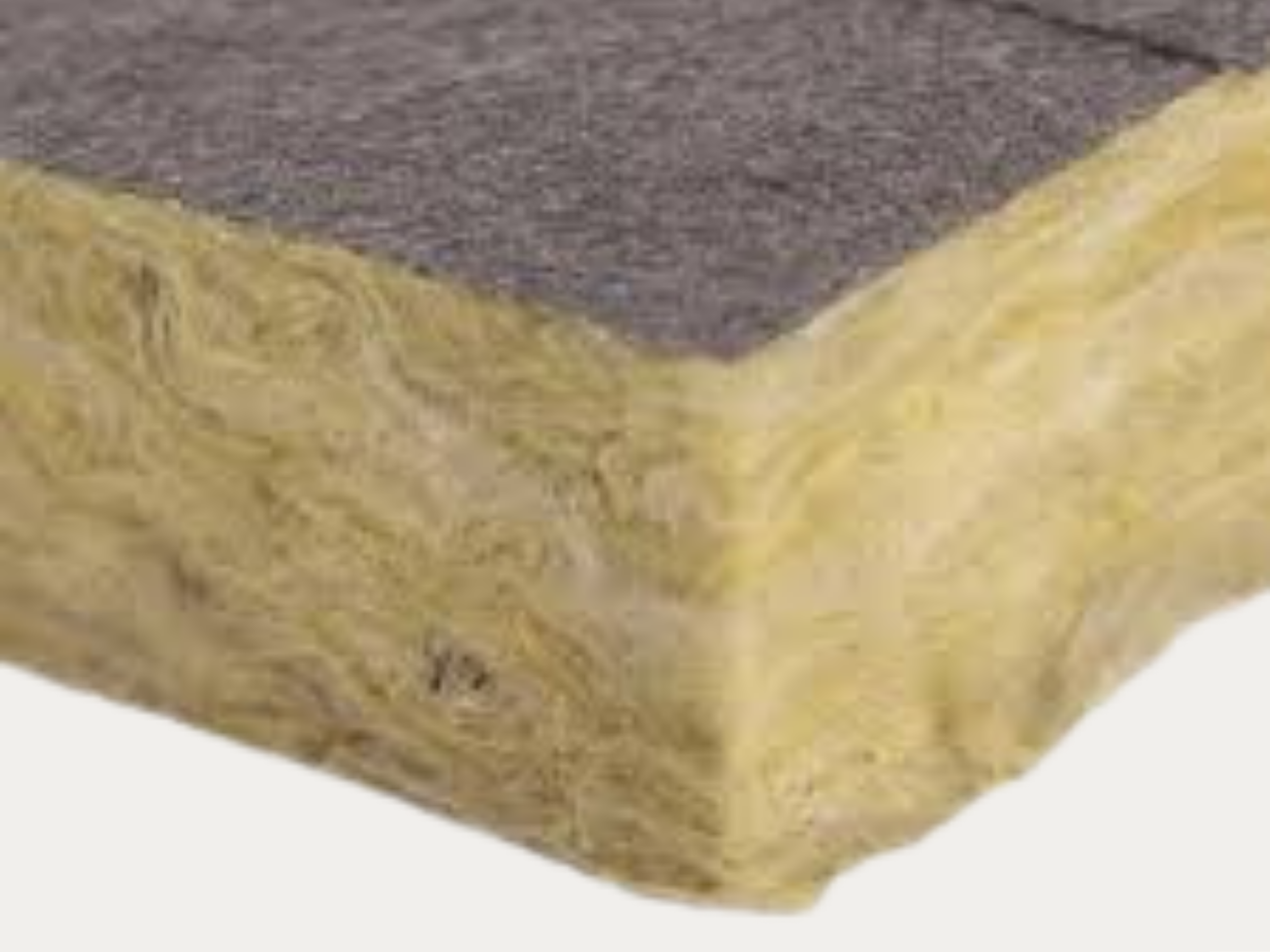 Close-up of a block of yellowish soap with a purple top.