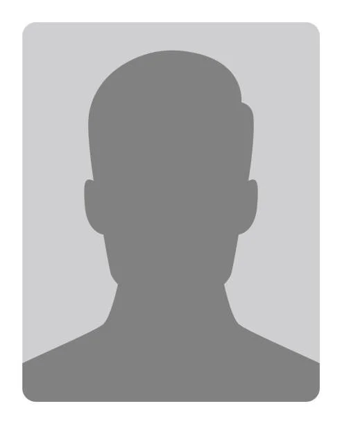 Silhouette of a person's head and shoulders in grayscale.