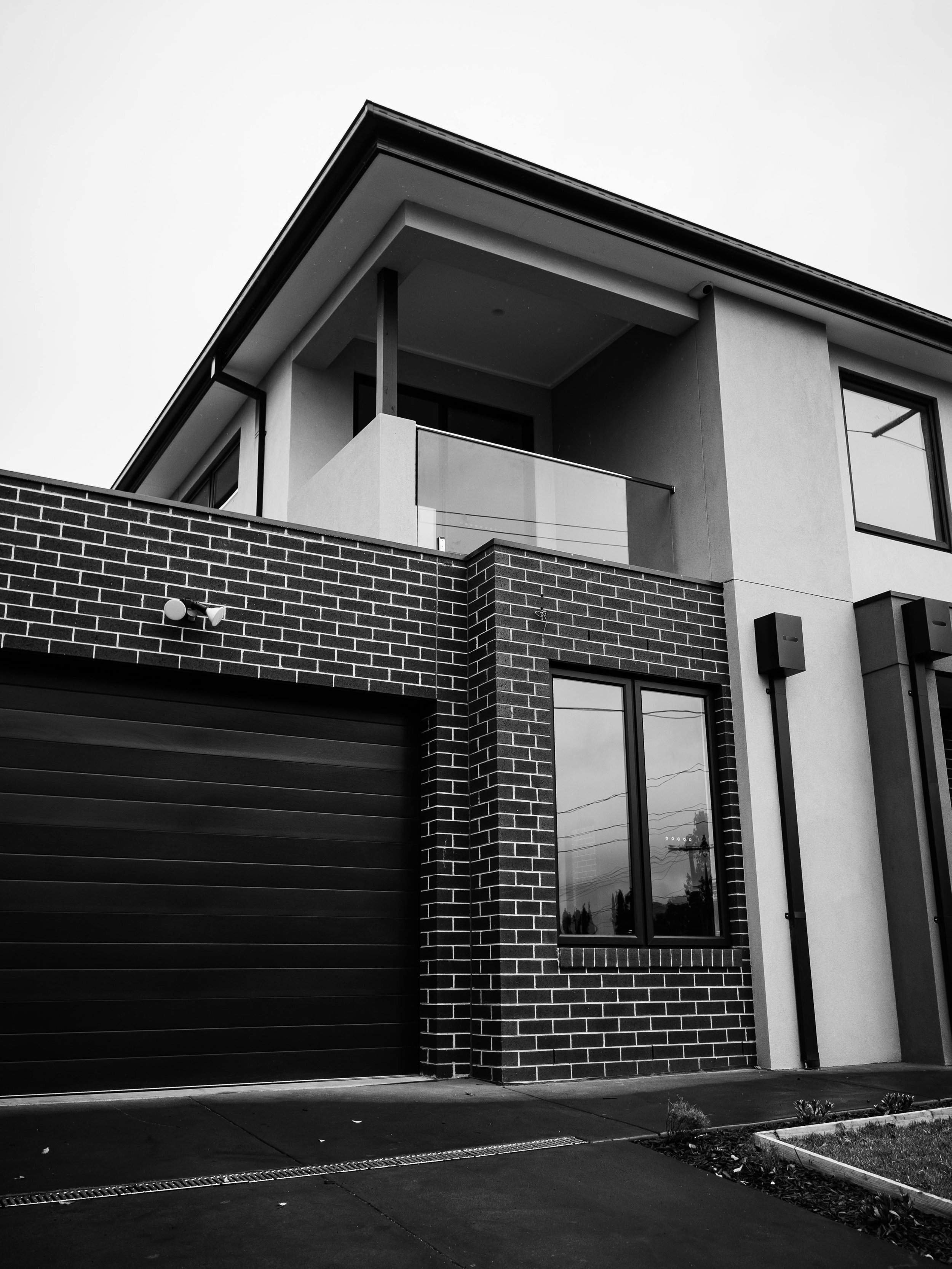Modern brick and render facade - High-quality residential construction and exterior rendering in Ipswich.