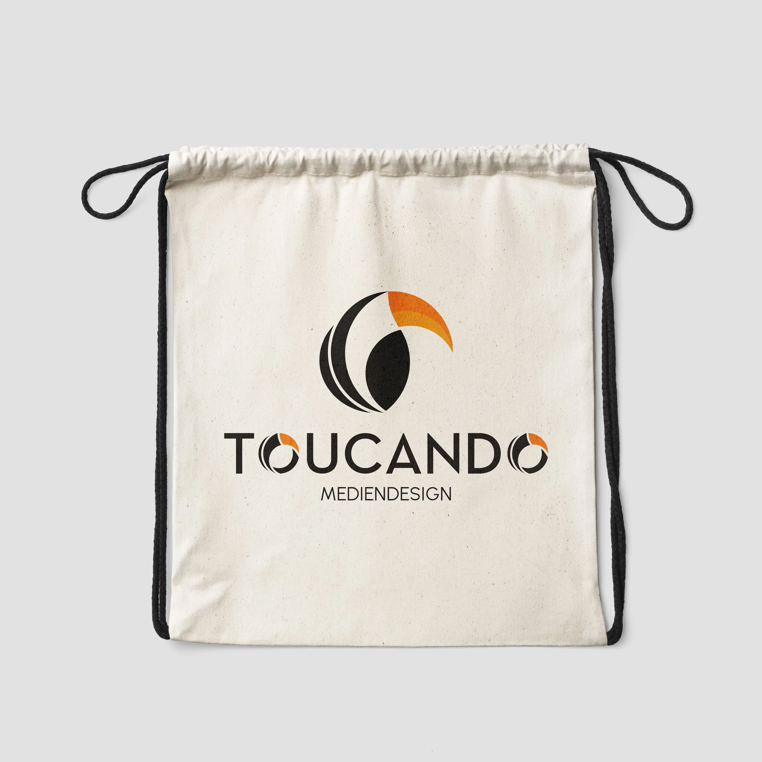 Leinwandbeutel mit Logo und Text 'Toucan MedienDesign'