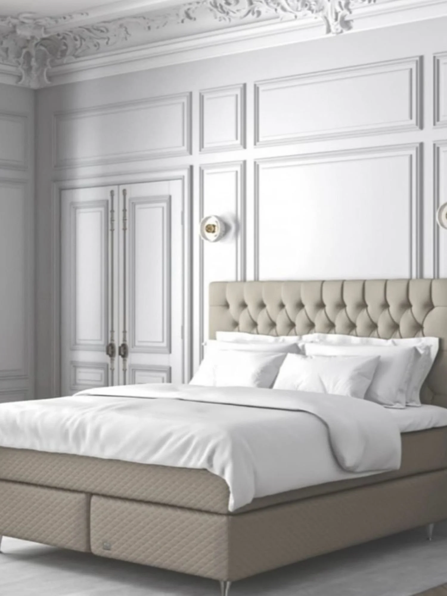 En nydelig oppredd seng fra Englesson med masse puter og et lekkert sengetøy