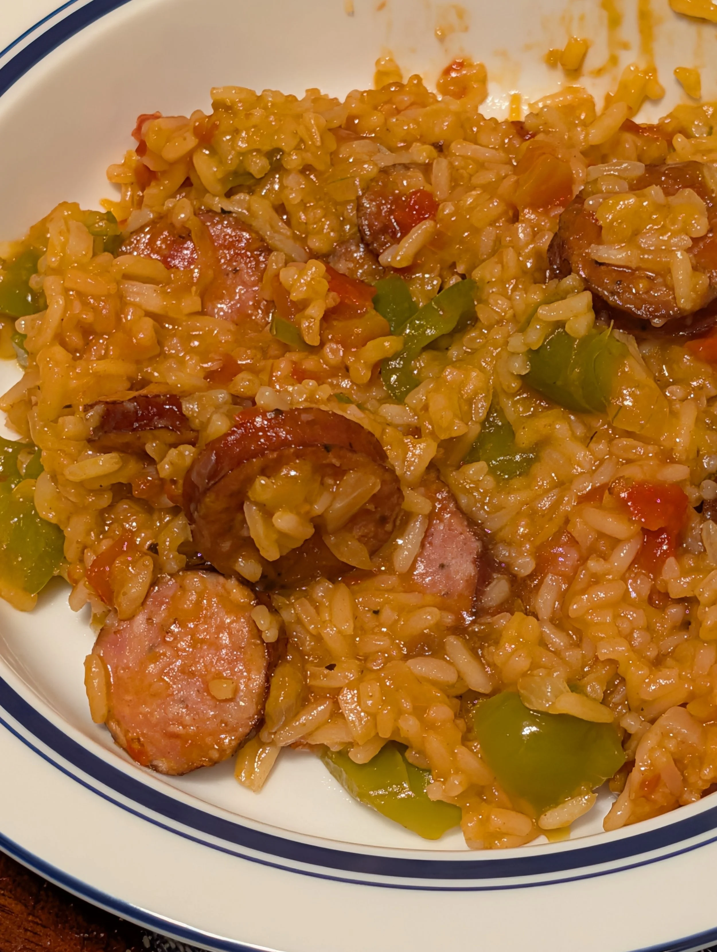 A delicious dish of rice and kielbasa with onions and green peppers