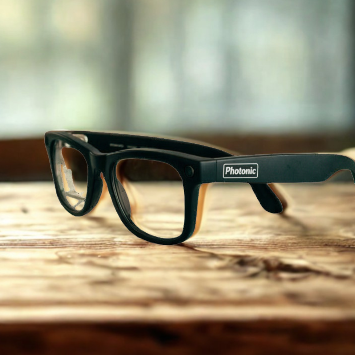 Black glasses with the logo Photonic on the side