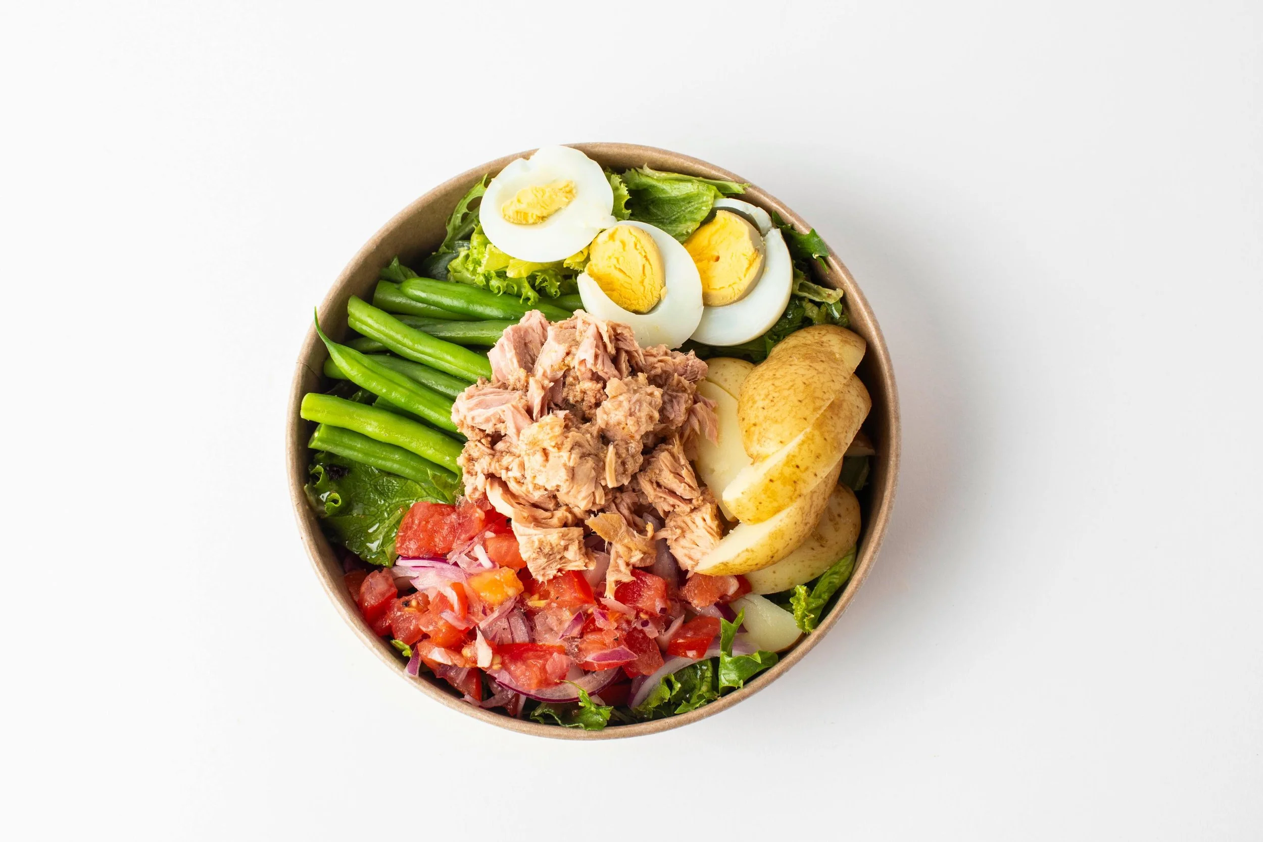Fresh, filling, and packed with goodness 🥗

Our Tuna Ni&ccedil;oise Salad combines flaky tuna, free-range boiled eggs, baby potatoes, crisp green beans, mixed leaves, and a vibrant tomato and red onion salsa for the perfect balanced lunch.

Healthy 