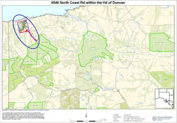 Map of 6546 North Coast Road within the Highway District of Duncan, showing various land parcels outlined in green, with some areas marked with hatched patterns, and a small inset map. Roads and land boundaries are labeled, with one area circled in blue. The map includes a north arrow and a scale at the bottom.