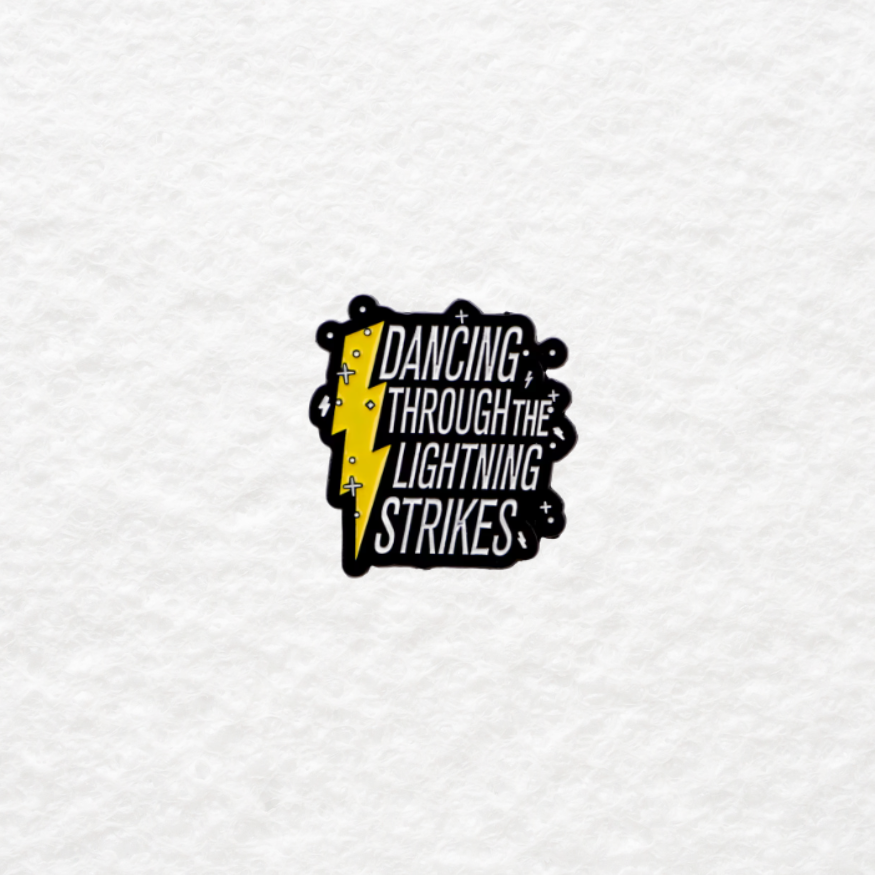 Dancing Through the Lightning Strikes enamel pin