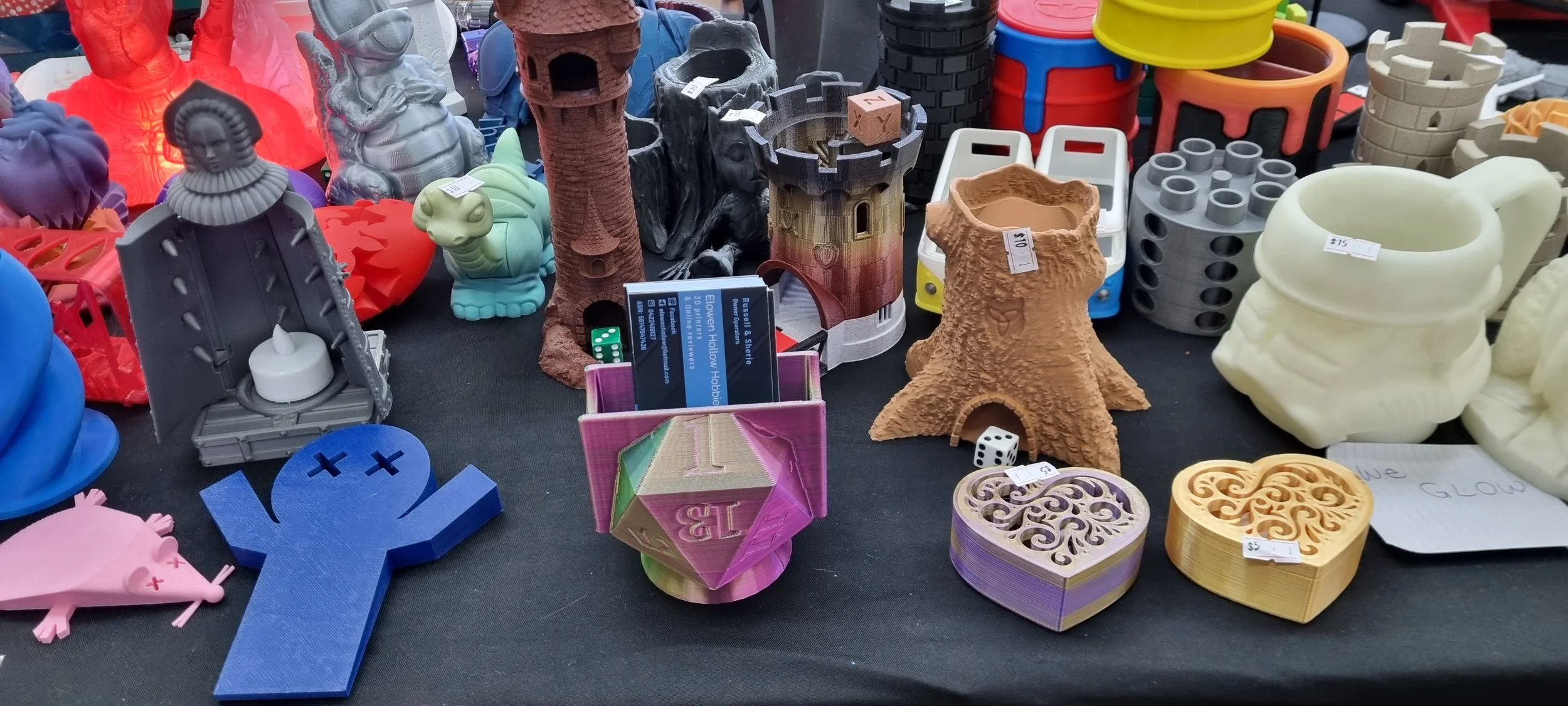 customized business card holders, dice towers and tea light holders