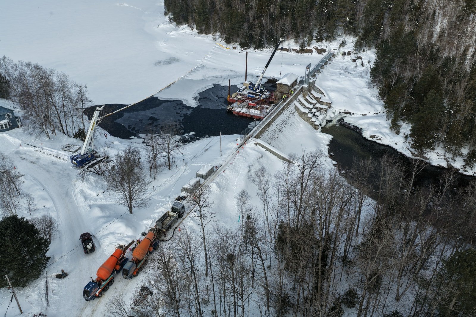 Overhead photo of us placing concrete at Indian Lake Dam