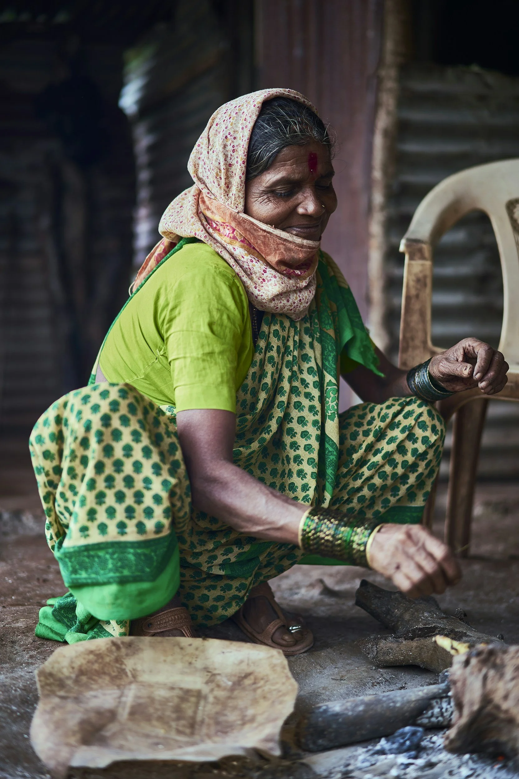 Rural woman in a traditional setting representing community livelihoods and grassroots realities.