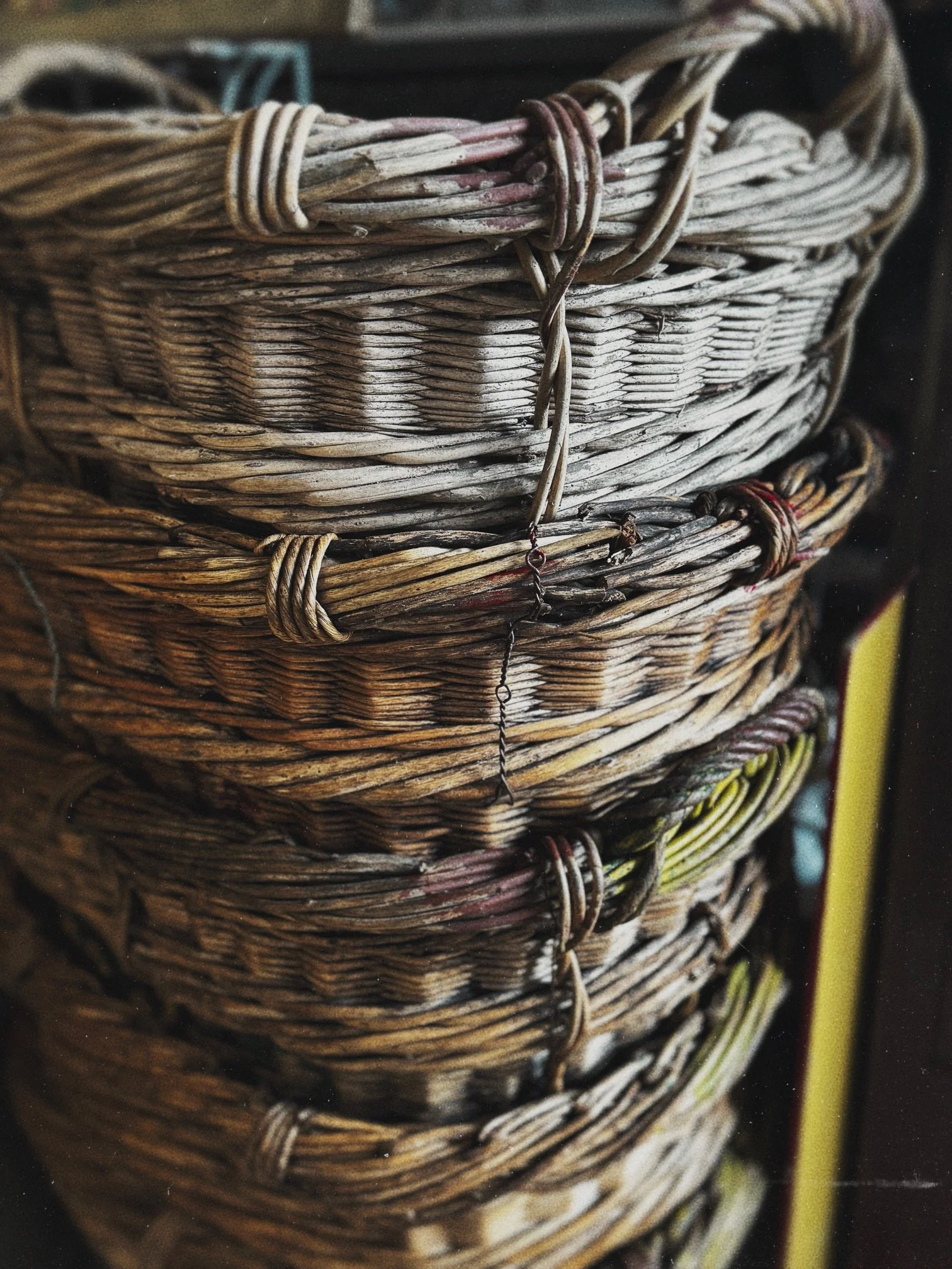 Close-up of stacked woven baskets made of twigs or wicker.