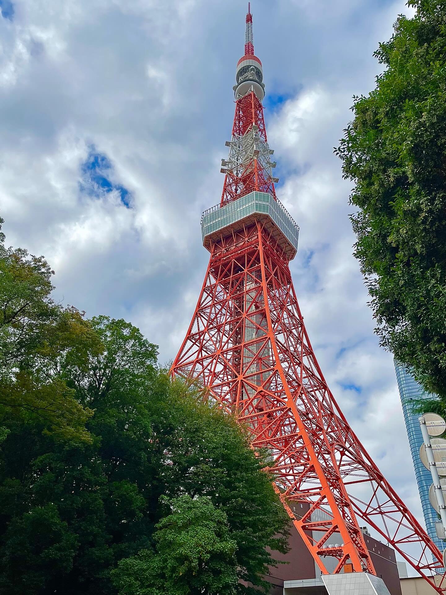 Tokyo Tower! 🗼

Beautiful and iconic!

Seen during the day and at night with illuminations...
I really like how it reflects perfectly in the windows above the nearby Family Mart! It's like an urban version of the popular Lawsons Mt Fuji shot, but ha