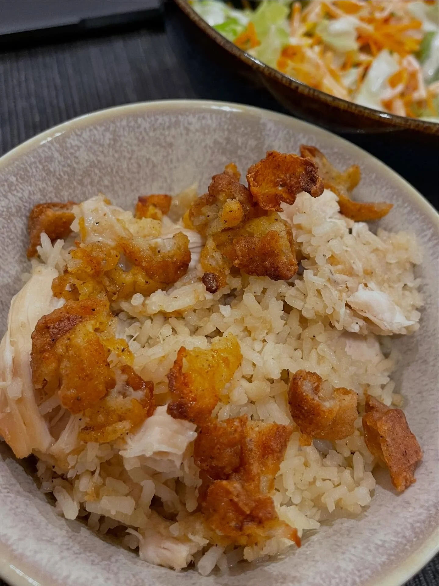 KFC Chicken Rice!

We added two pieces of KFC chicken into the rice cooker with rice and chicken stock...

It's both the best rice and the best KFC ever! 
I recommend saving half the skin to crisp up under the grill and using that as a topping! 

#kf