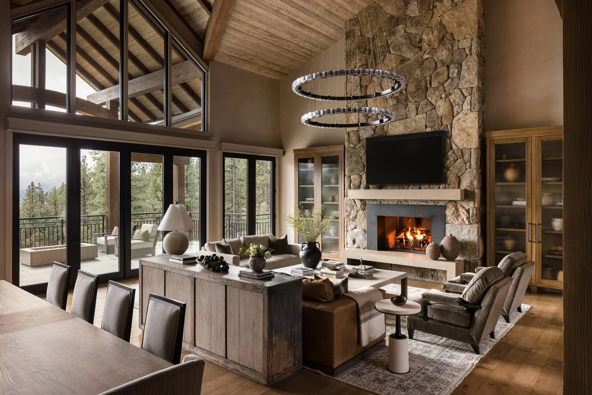 living room with stone fireplace