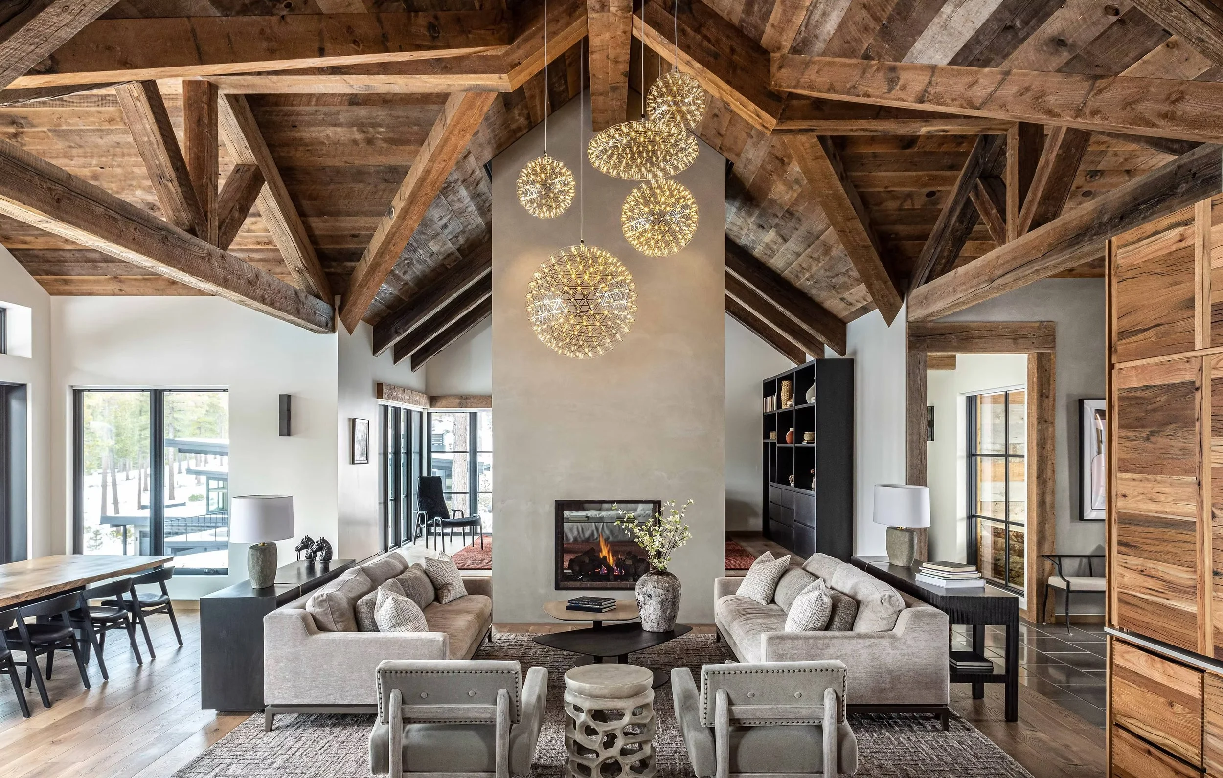 living room with fireplace and unique lighting fixtures