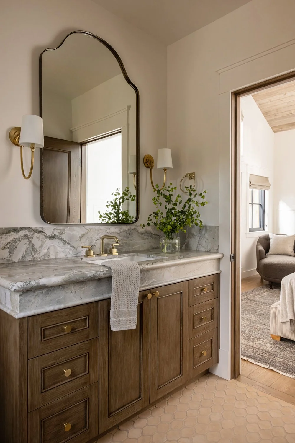 guest bathroom sink and mirror