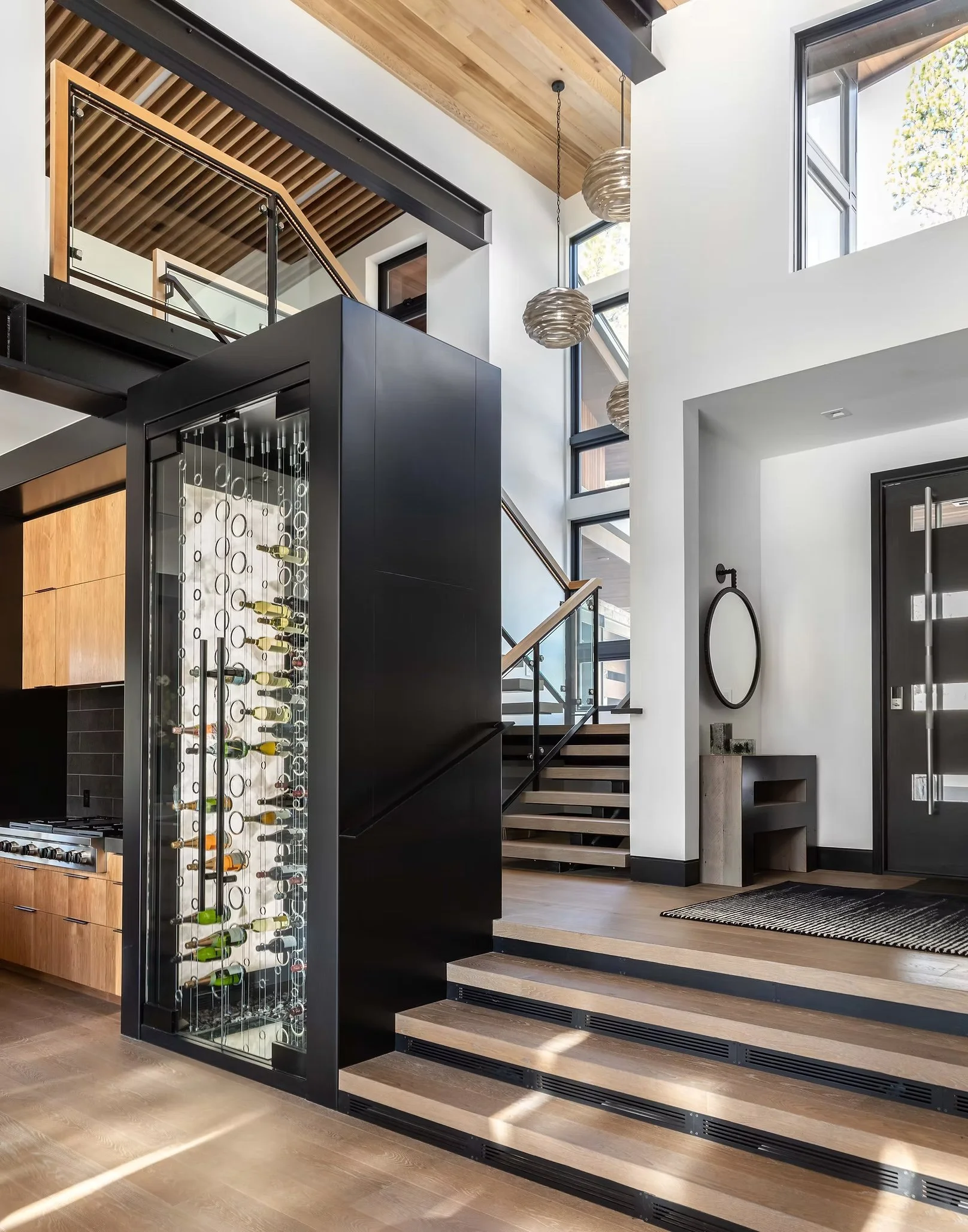 kitchen leading up to staircase and entryway