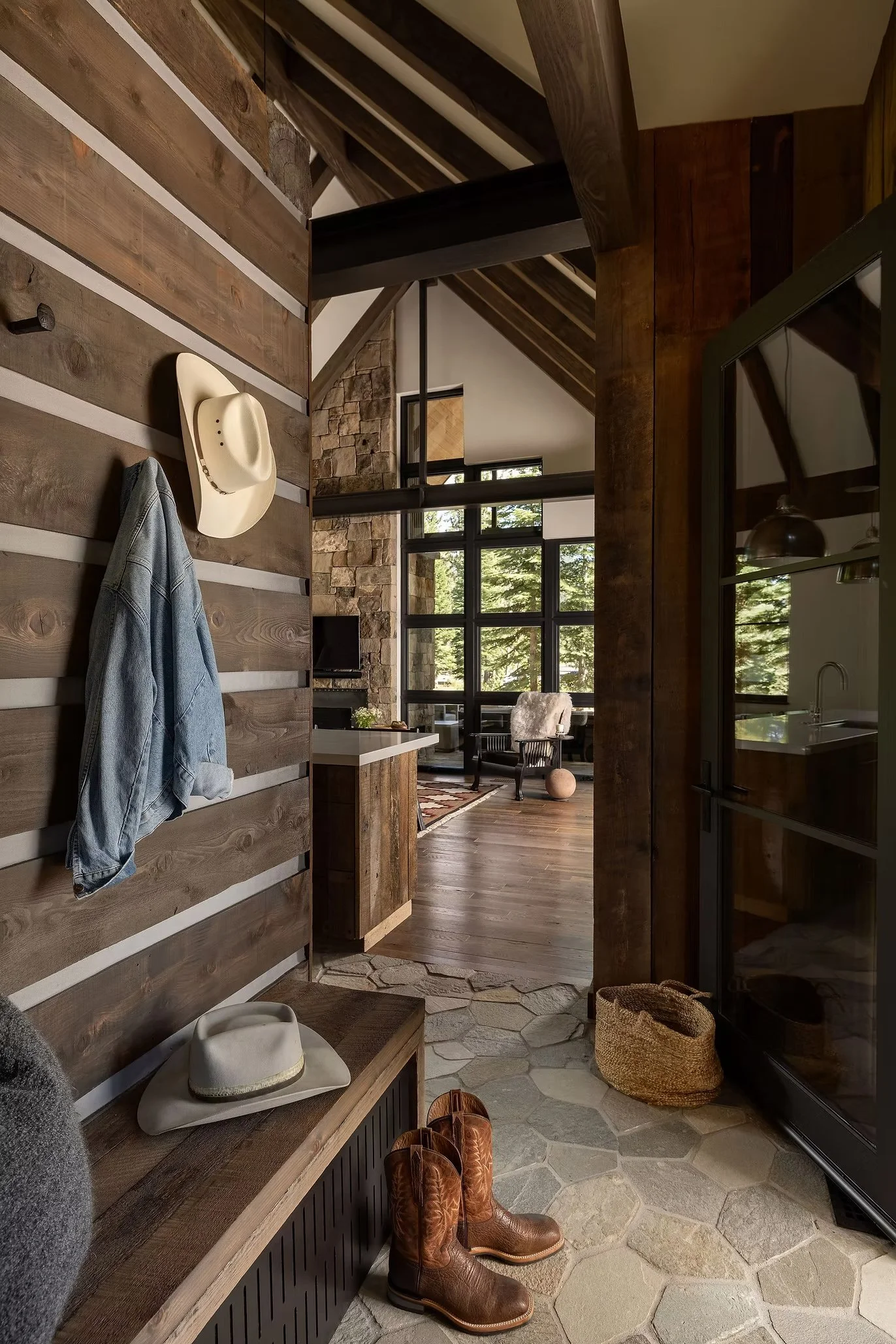 entry way with wall and hanging hooks