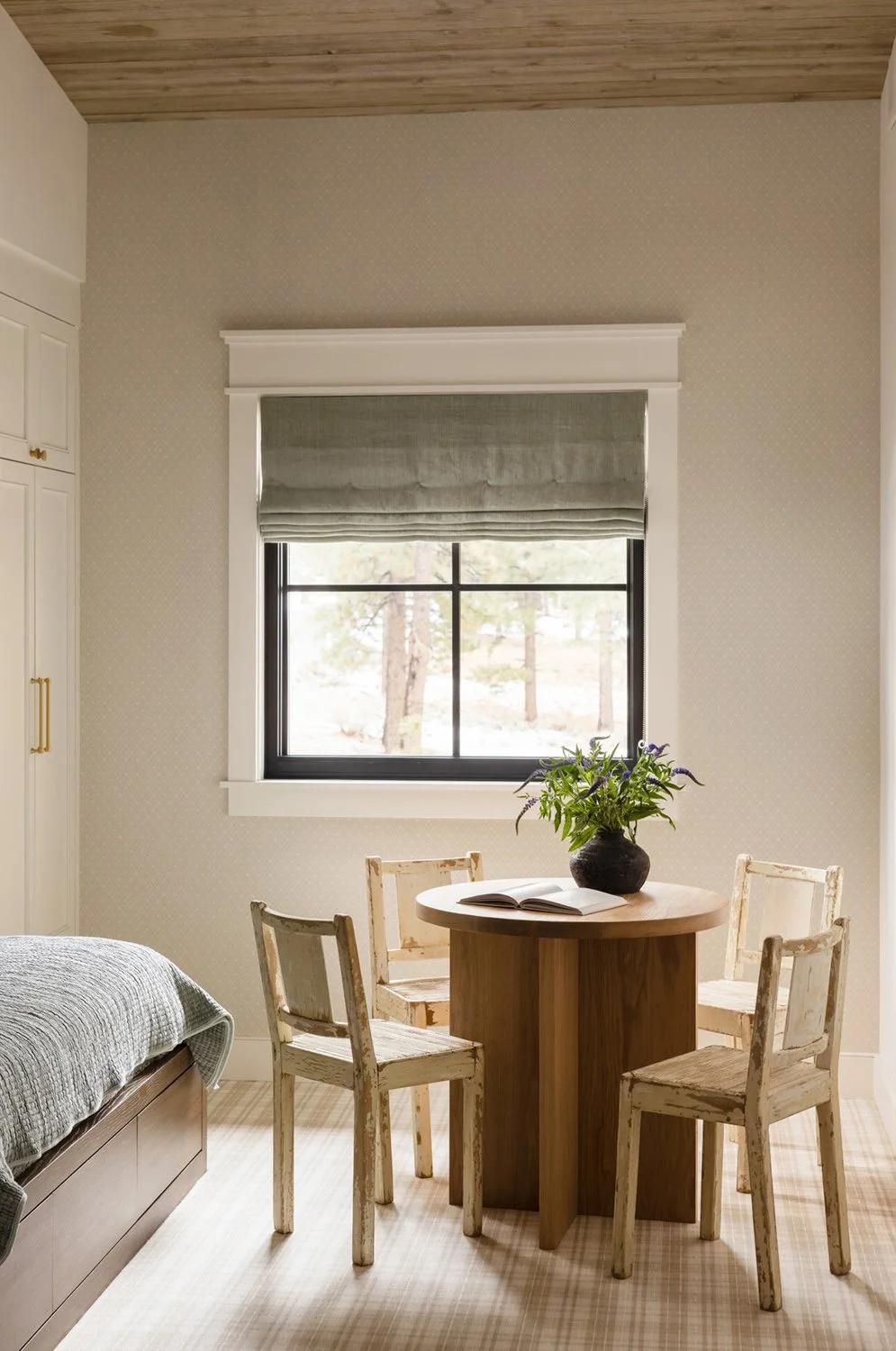 guest bedroom with table and chairs