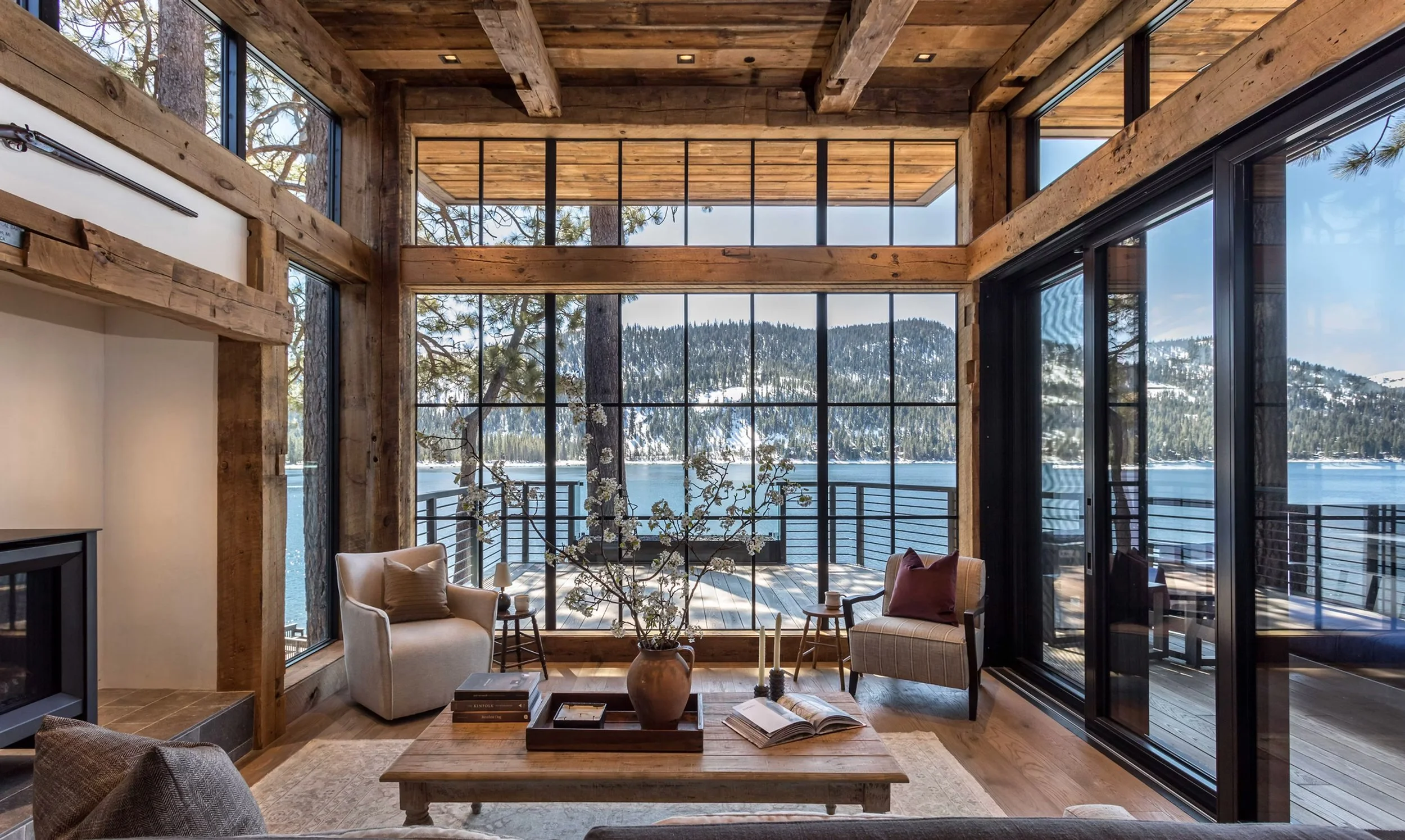 living room with mountain and lake view