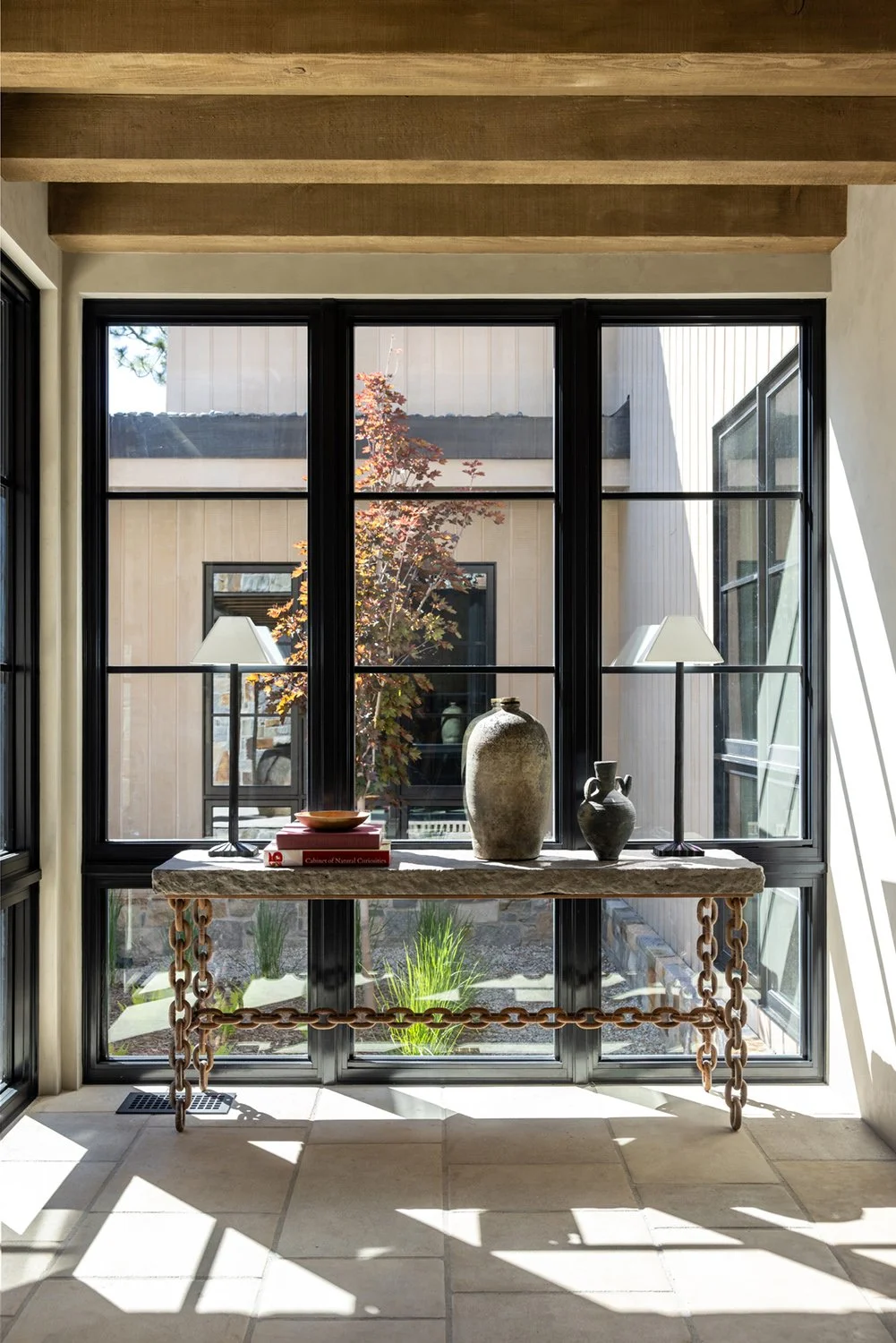 decorative table in front of window