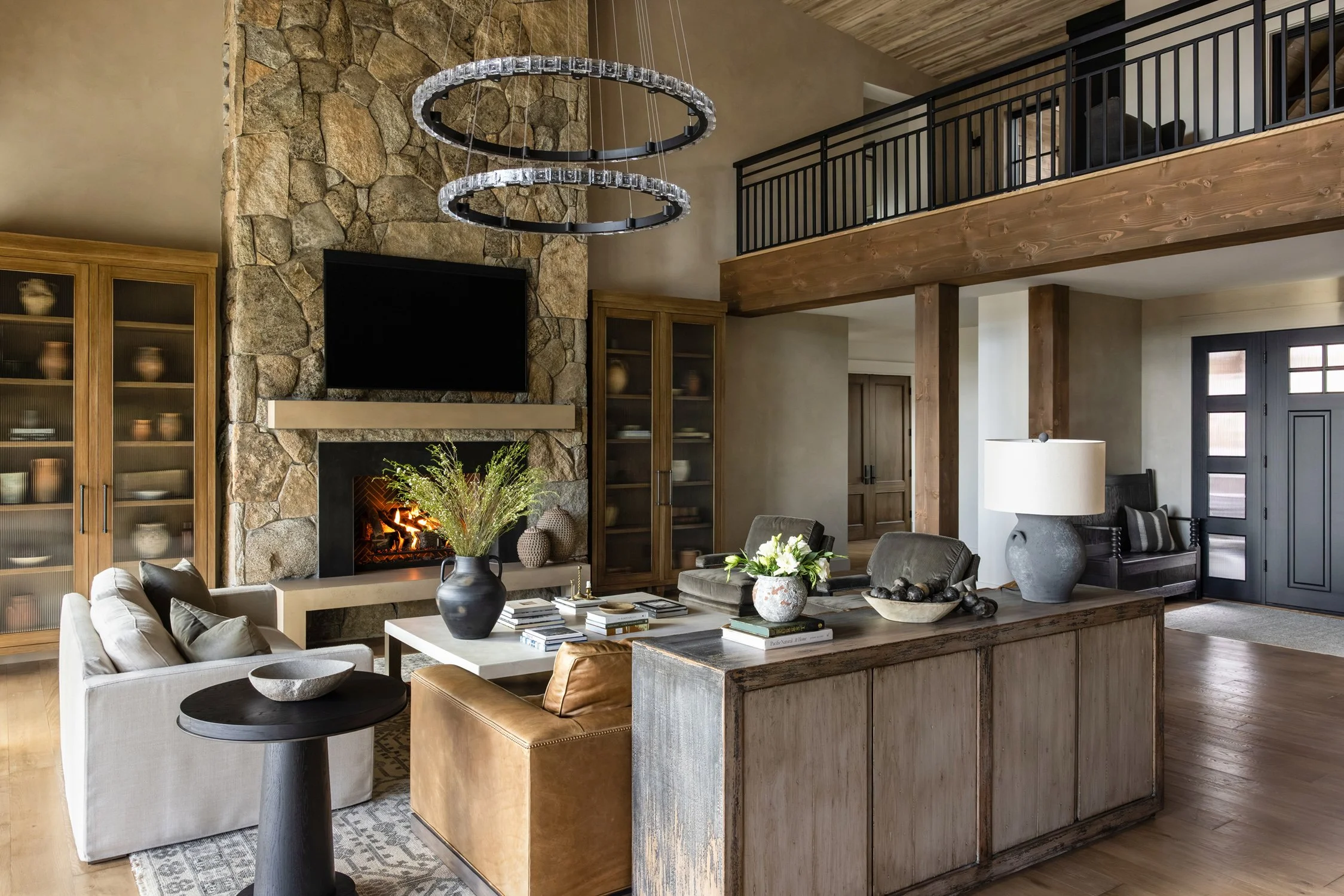 living room with stone fireplace - wider angle