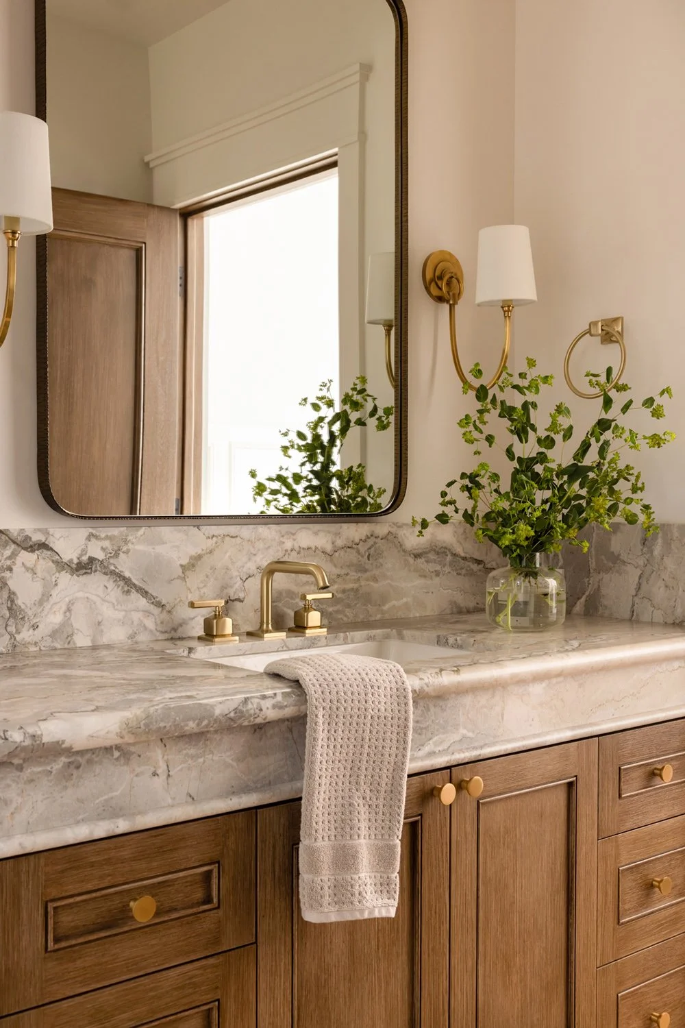 guest bathroom sink and mirror