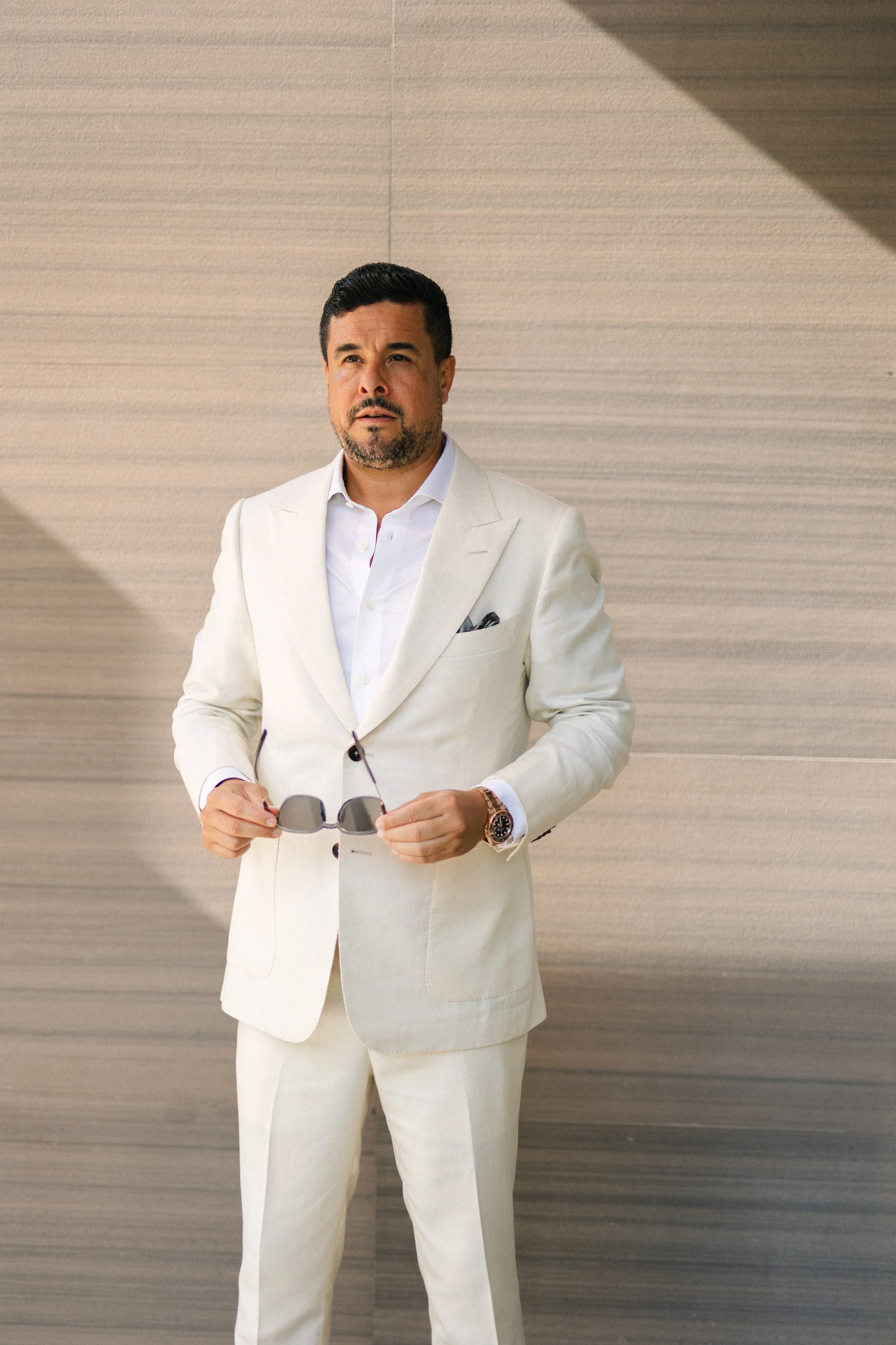 Groom editorial portrait Lake Vouliagmeni Athens Greece wedding