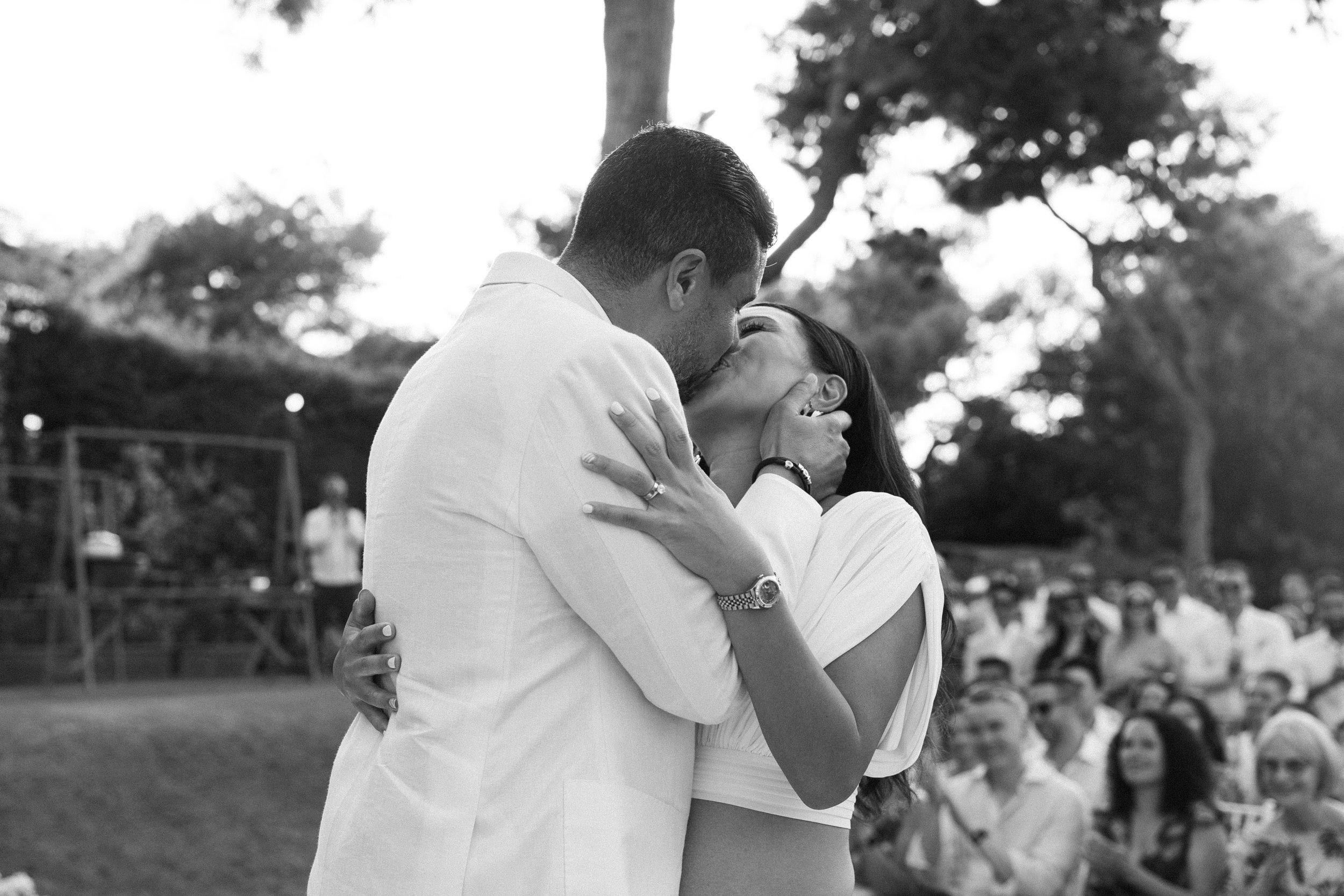 First kiss Lake Vouliagmeni Athens Greece wedding