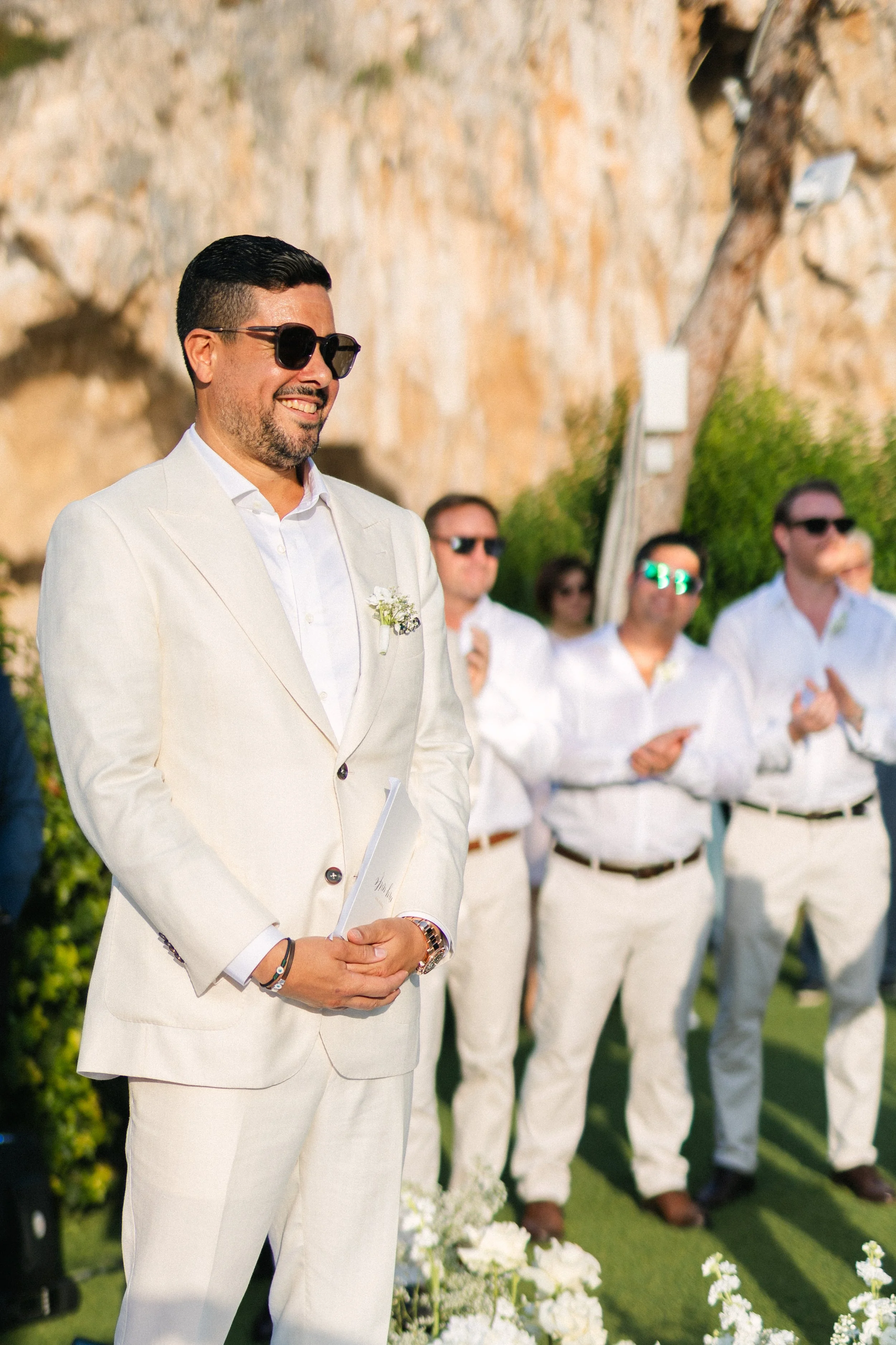 Groom emotional waiting for bride Lake Vouliagmeni Athens