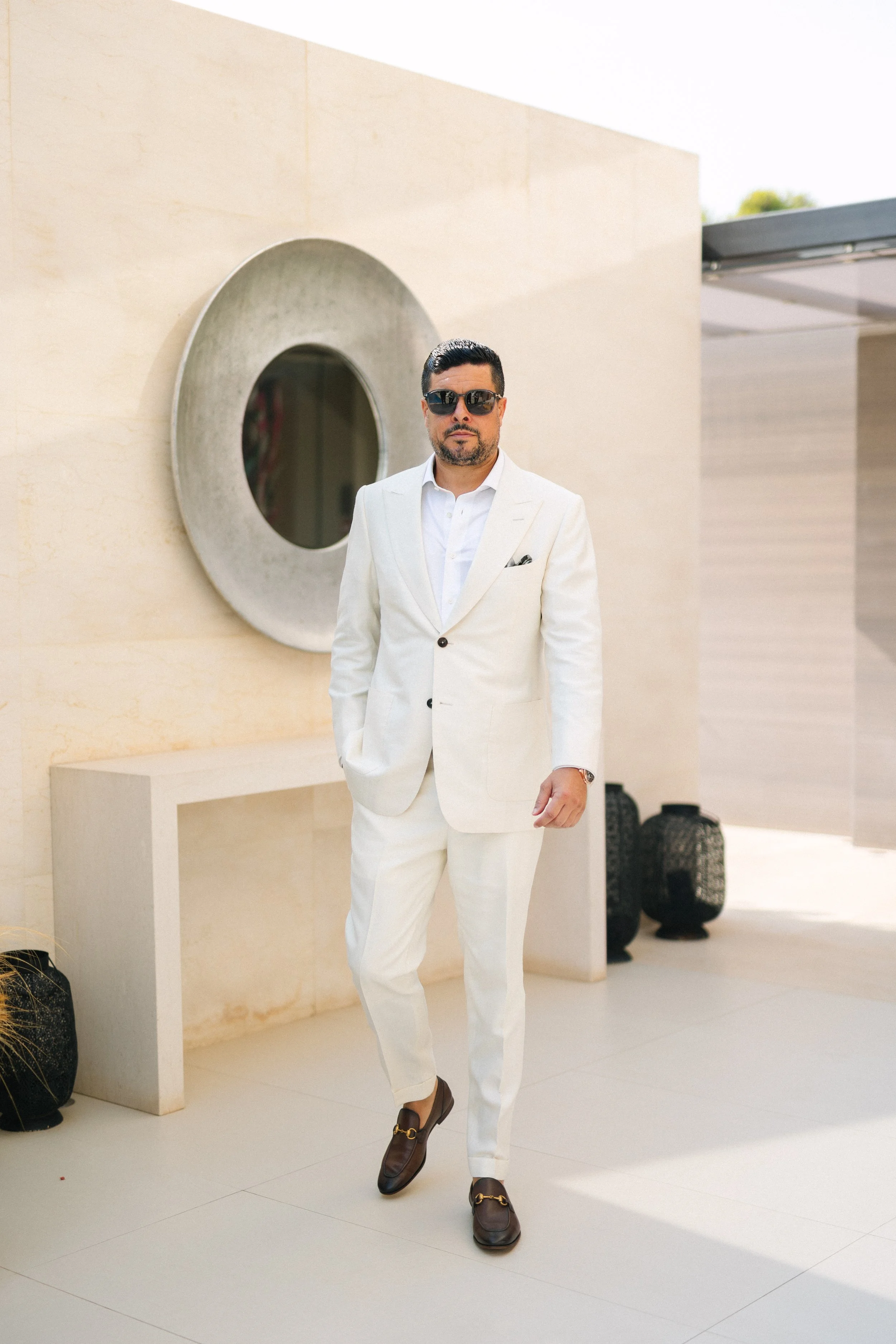 Groom editorial portrait Lake Vouliagmeni Athens Greece wedding