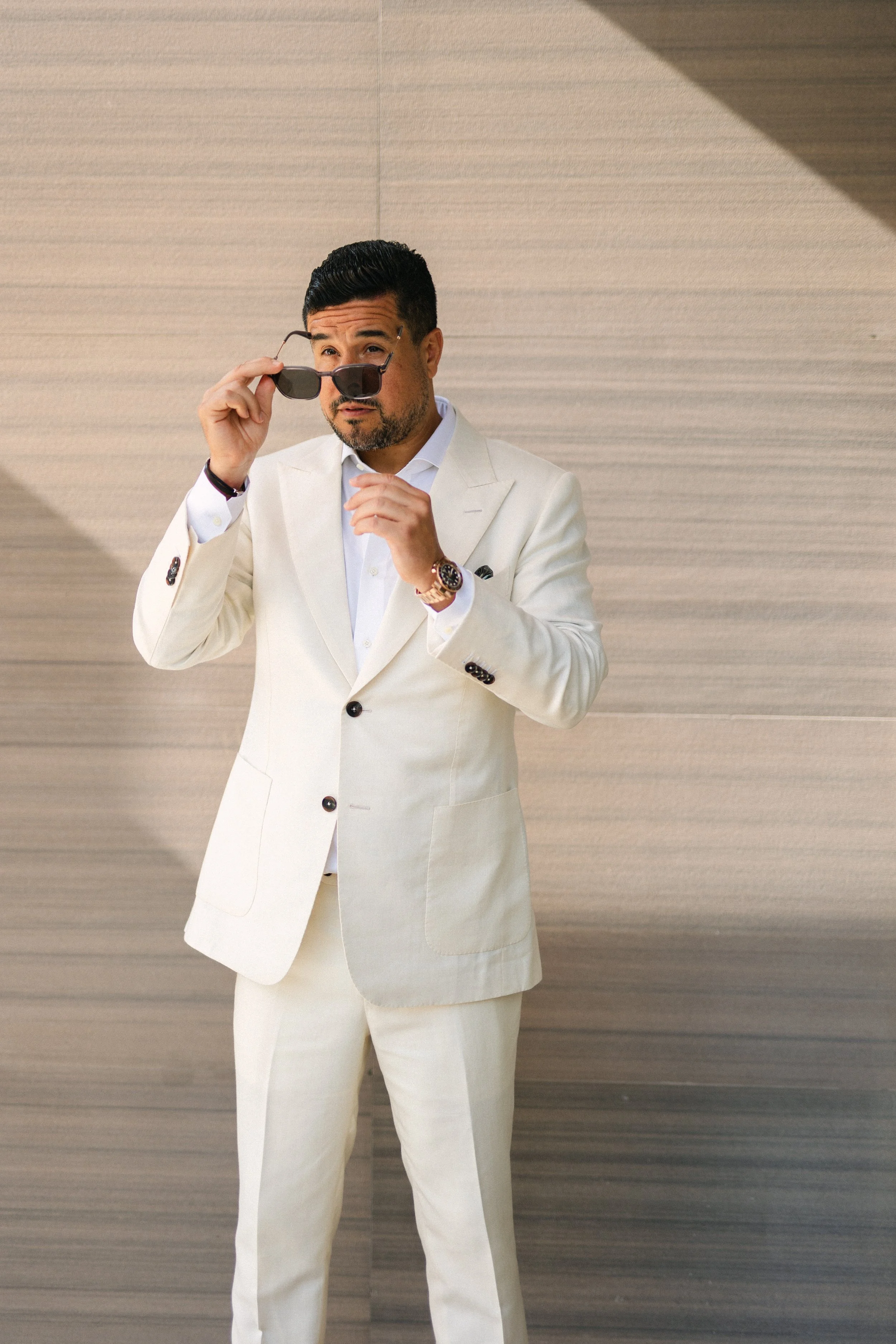 Groom editorial portrait Lake Vouliagmeni Athens Greece wedding