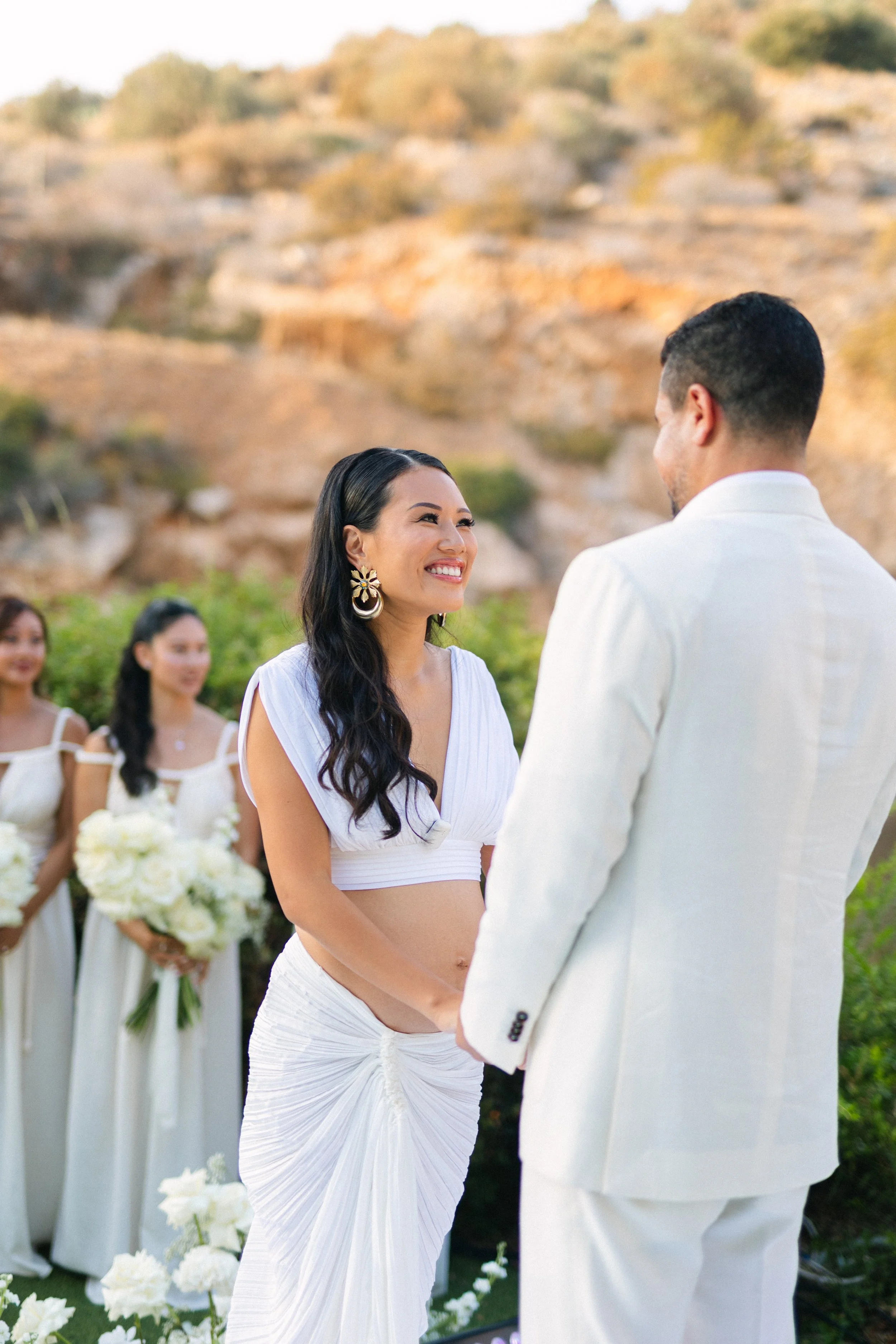 Emotional ceremony moment Lake Vouliagmeni Greece wedding