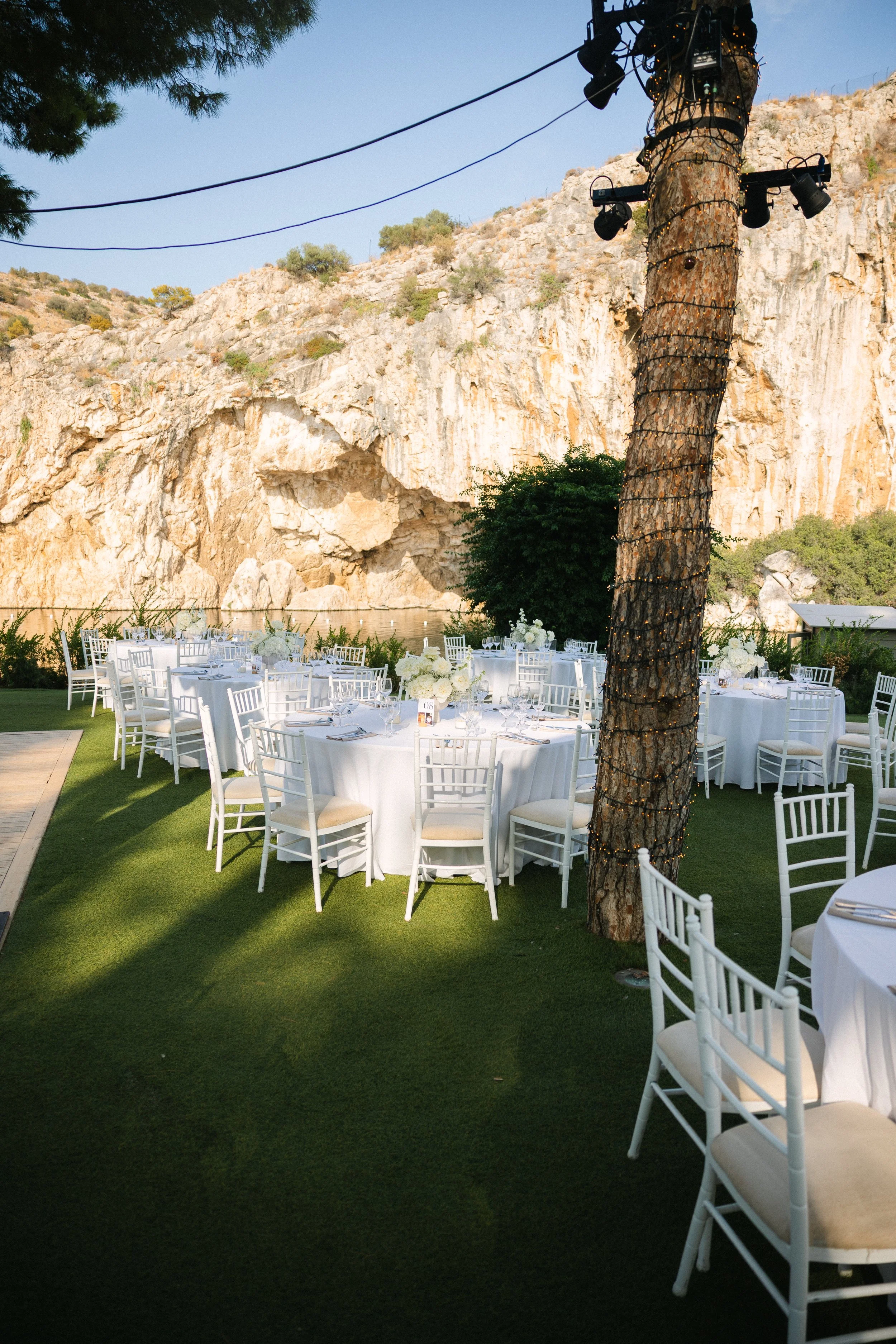 Wedding table setup Lake Vouliagmeni waterfront Athens