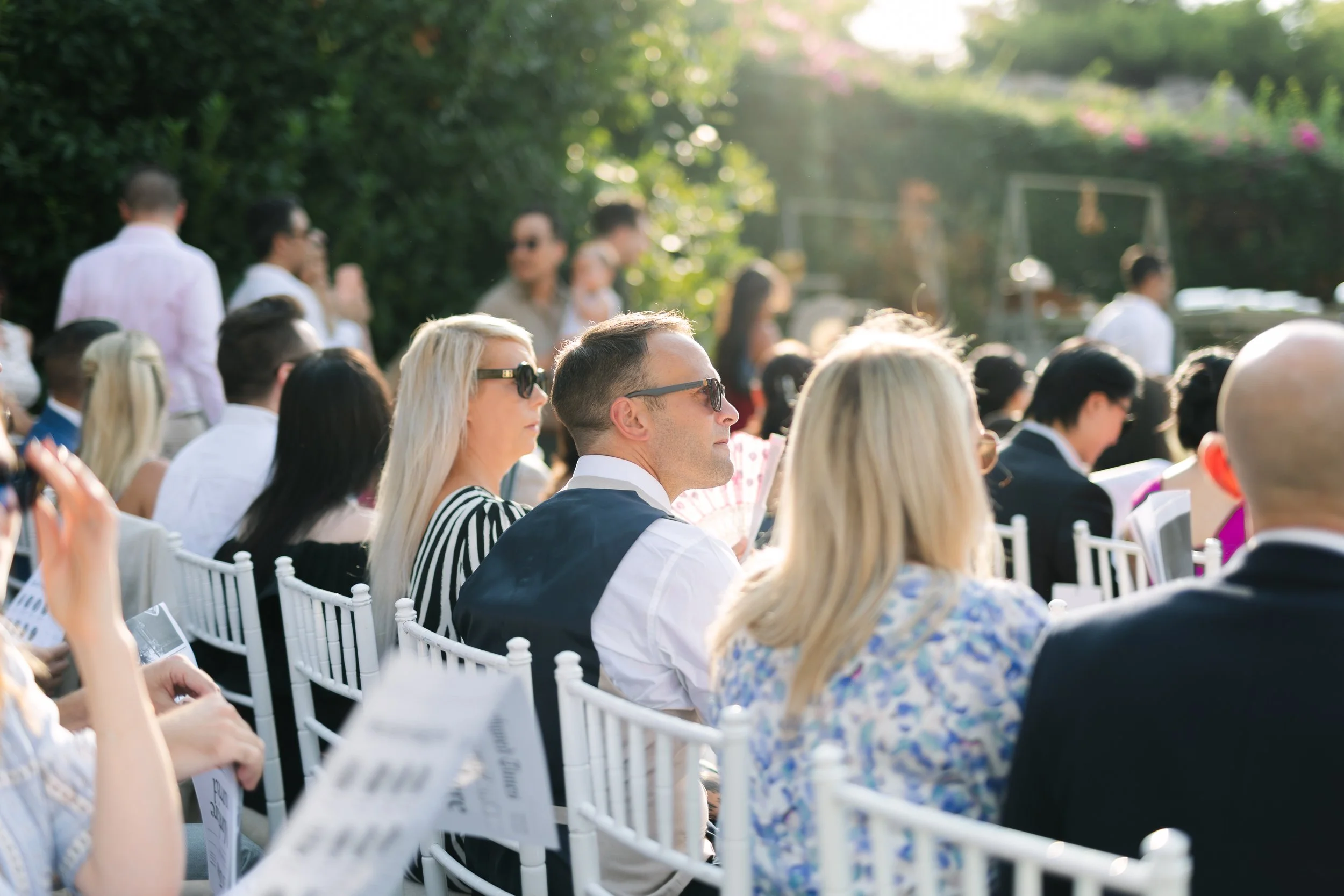 Wedding guest portrait Lake Vouliagmeni Athens Greece