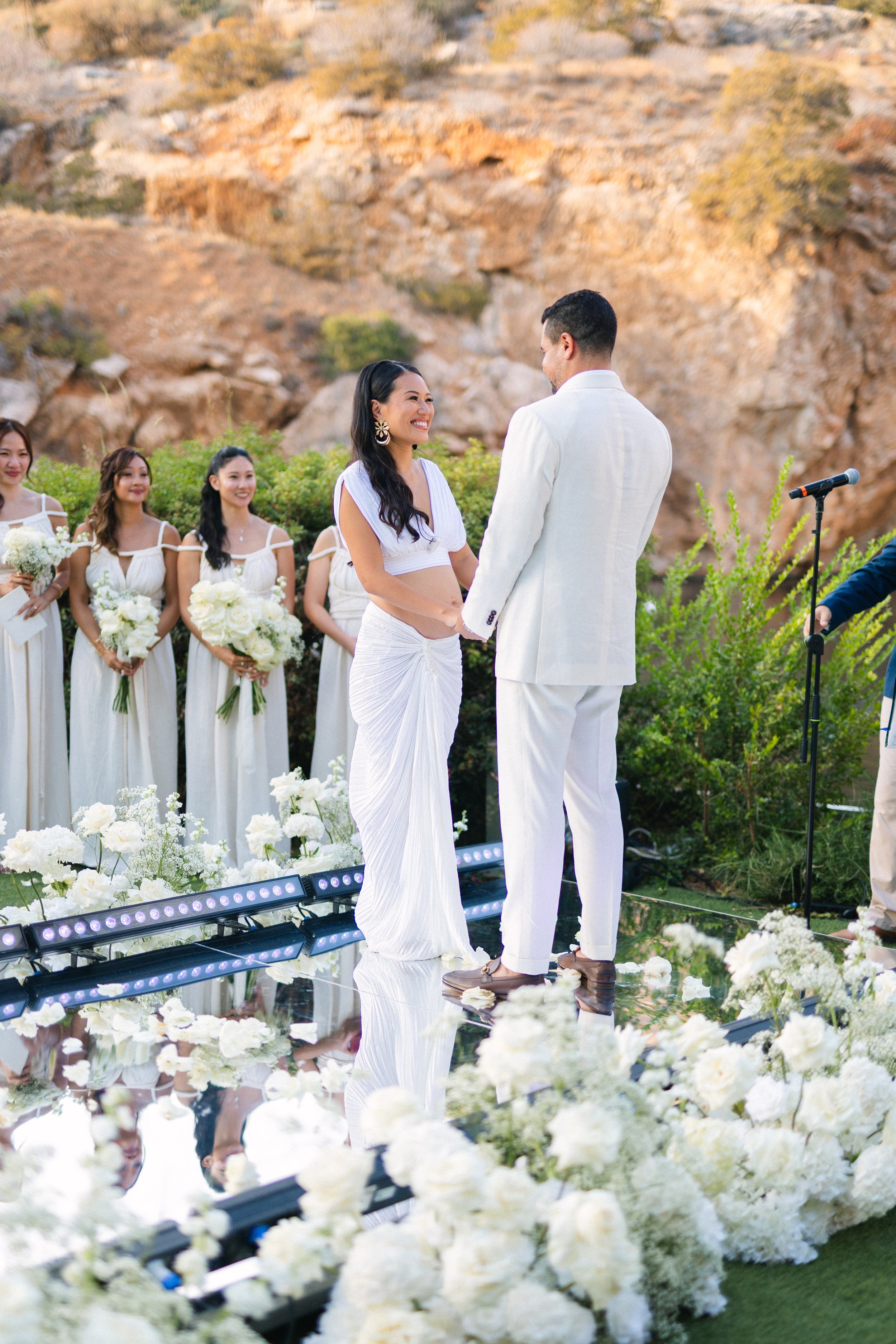 Emotional ceremony moment Lake Vouliagmeni Greece wedding