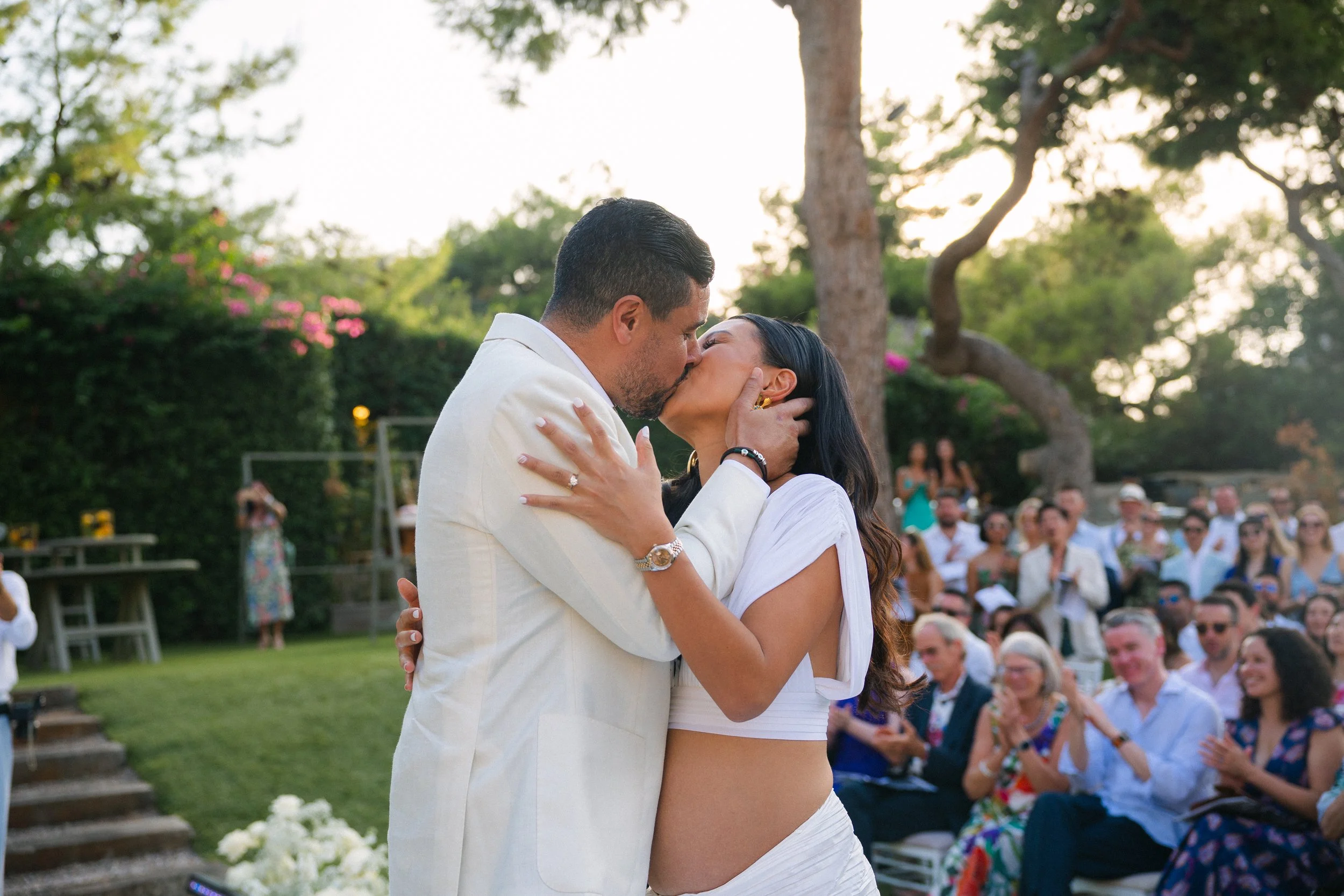 First kiss Lake Vouliagmeni Athens Greece wedding
