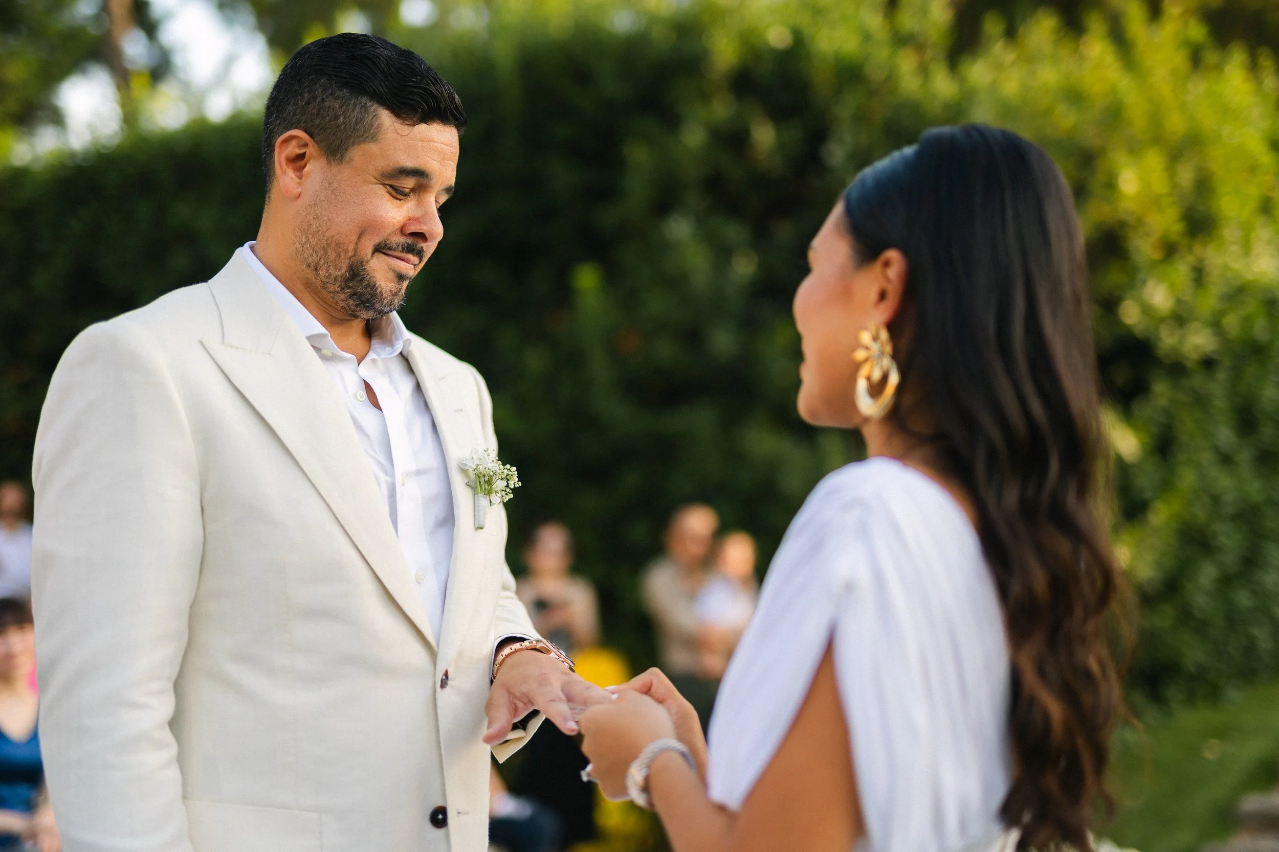 Emotional ceremony moment Lake Vouliagmeni Greece wedding
