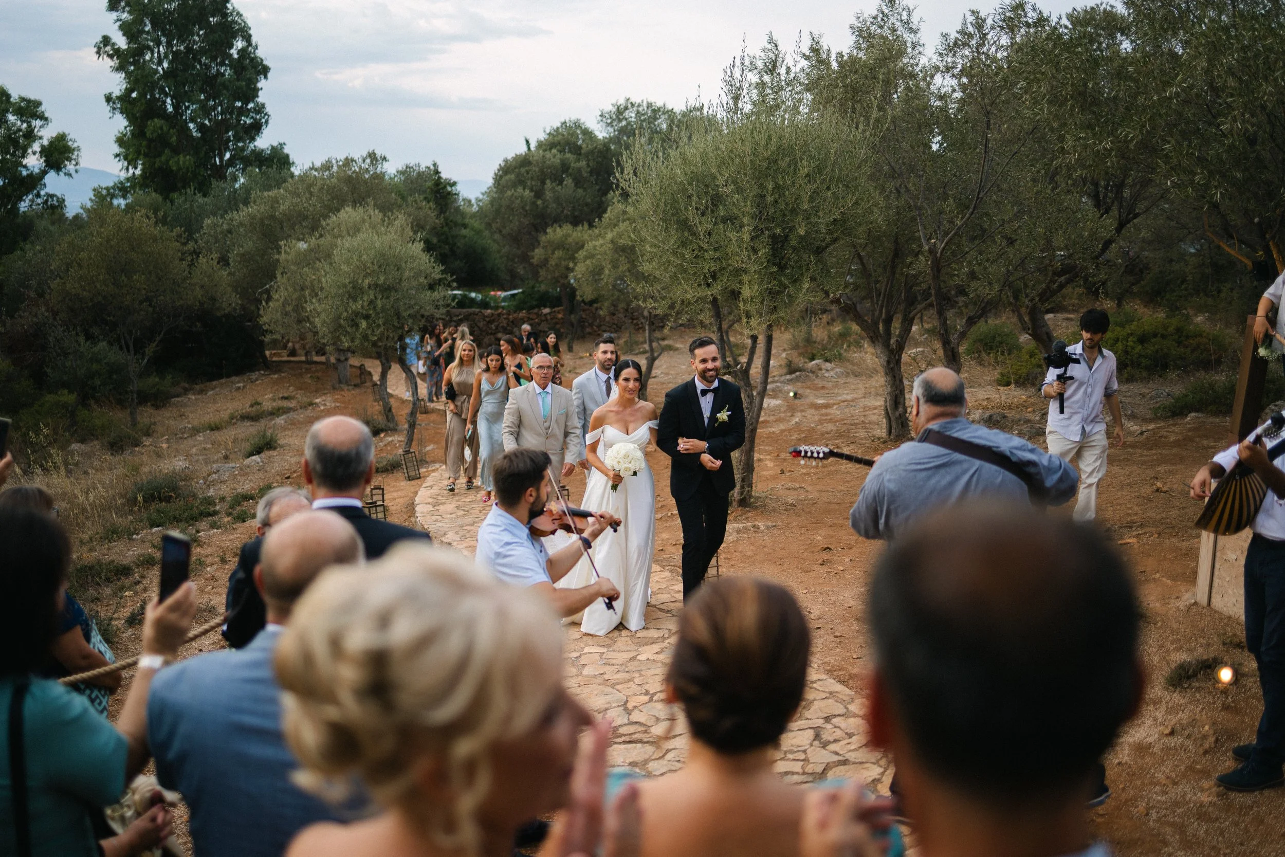 Bride walking down aisle emotional Iliou Petra estate Athens