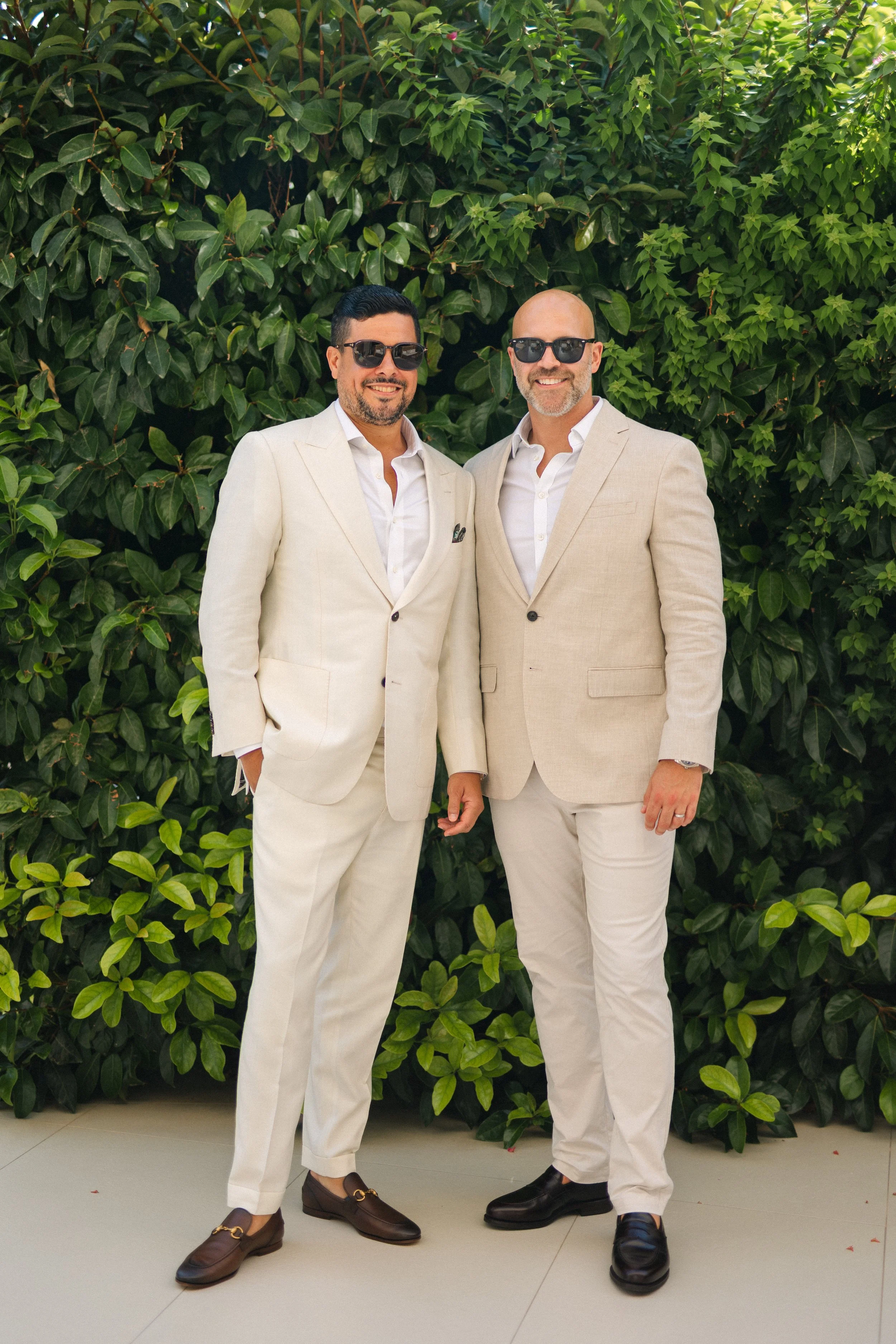 Groom and best man editorial portrait Lake Vouliagmeni Athens Greece wedding