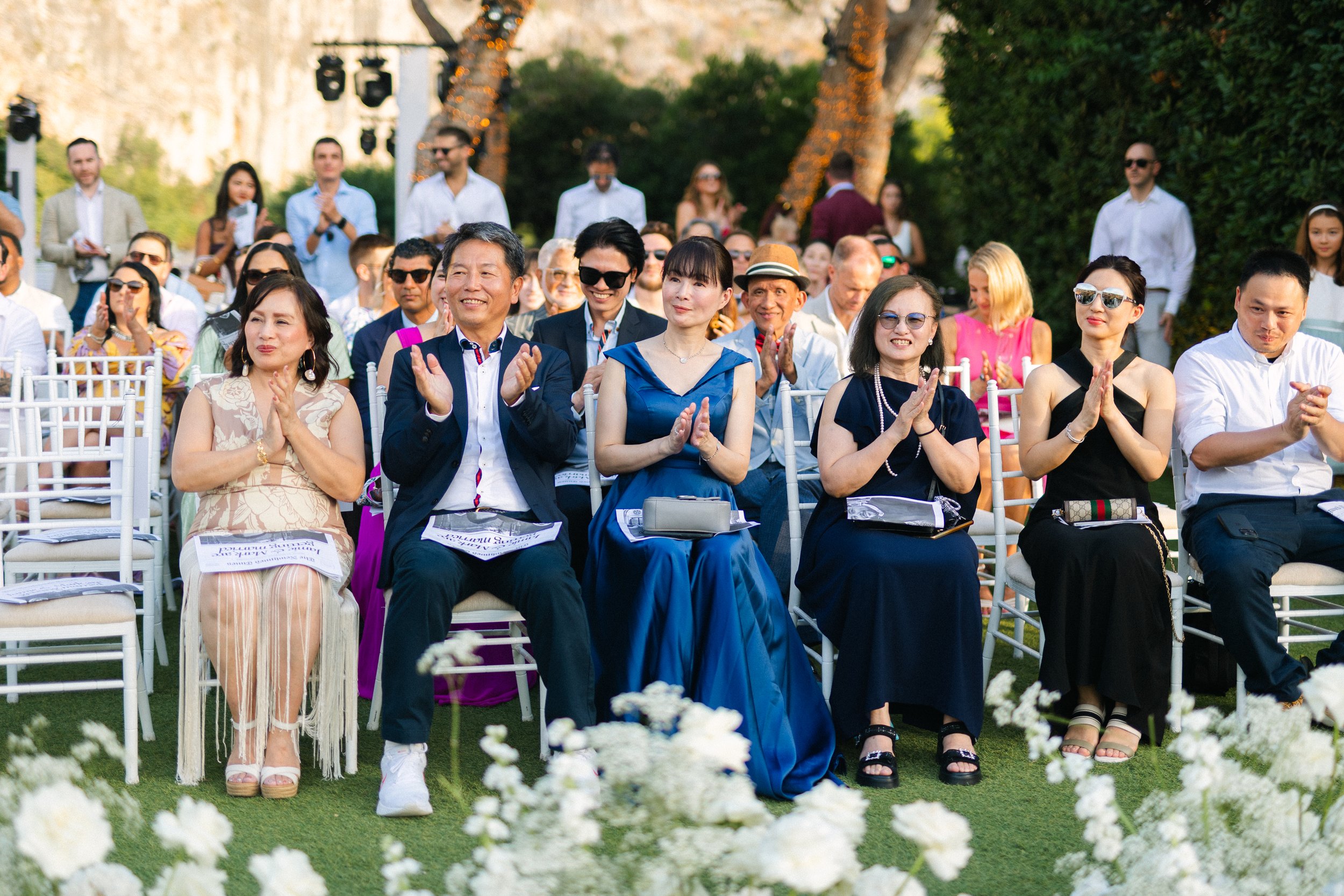 Wedding guest portrait Lake Vouliagmeni Athens Greece