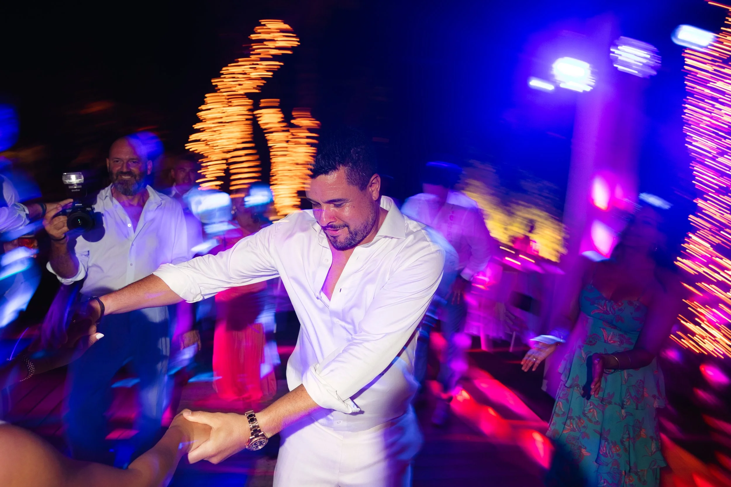 Wedding party night Lake Vouliagmeni waterfront Athens Greece