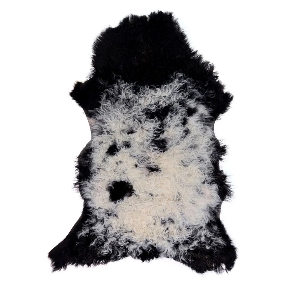 Lammskinn – svart och gråmelerat med livfull lockstruktur
