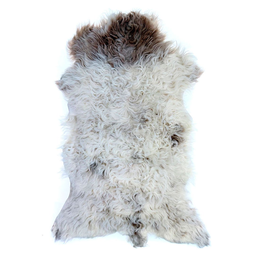 Lammskinn – ljusa naturtoner med mjuk och levande lockstruktur